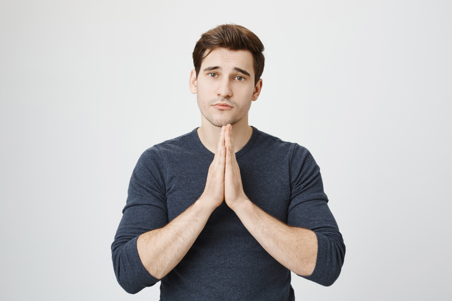 An apologetic man | Source: Freepik