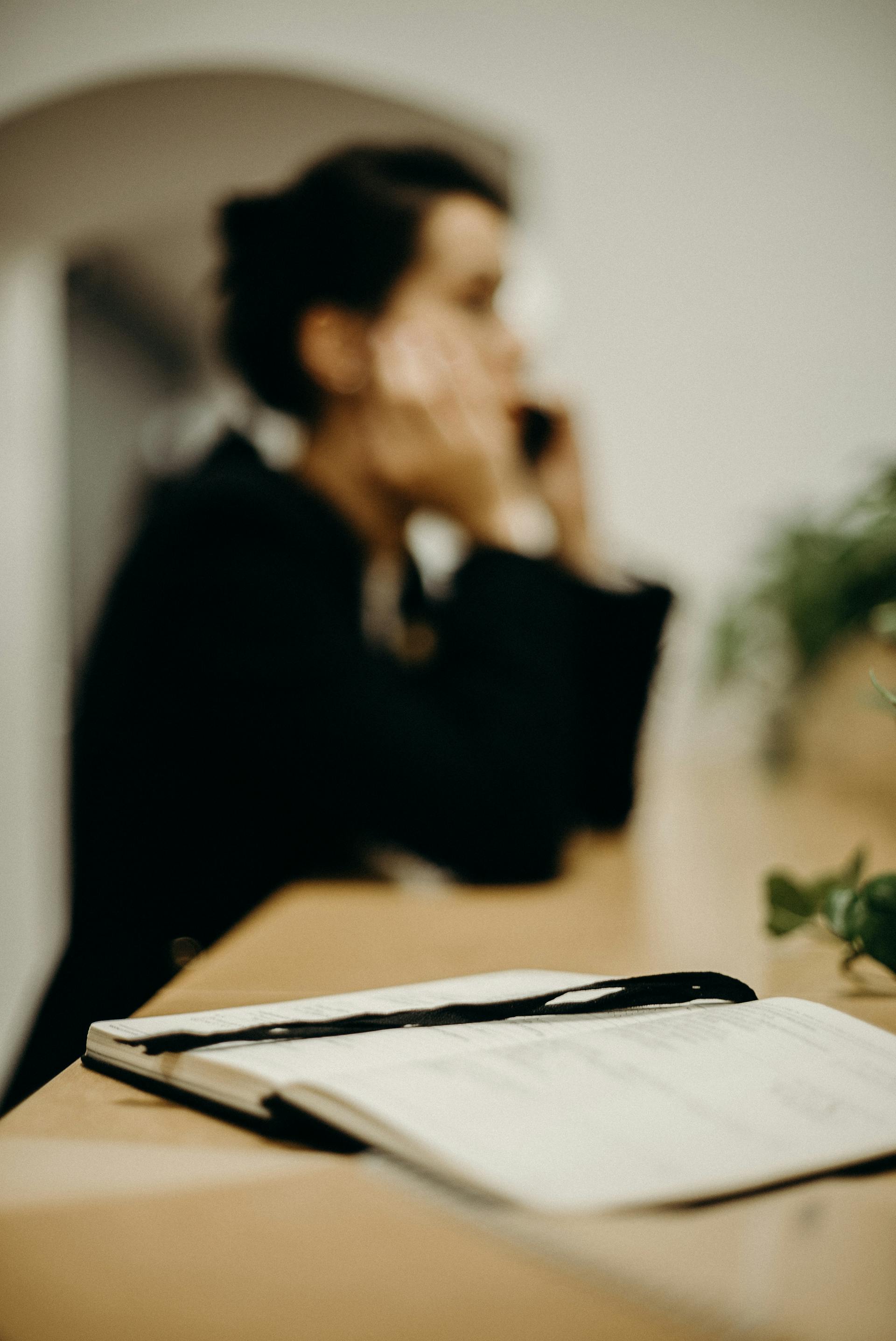 A woman speaking on her phone | Source: Pexels