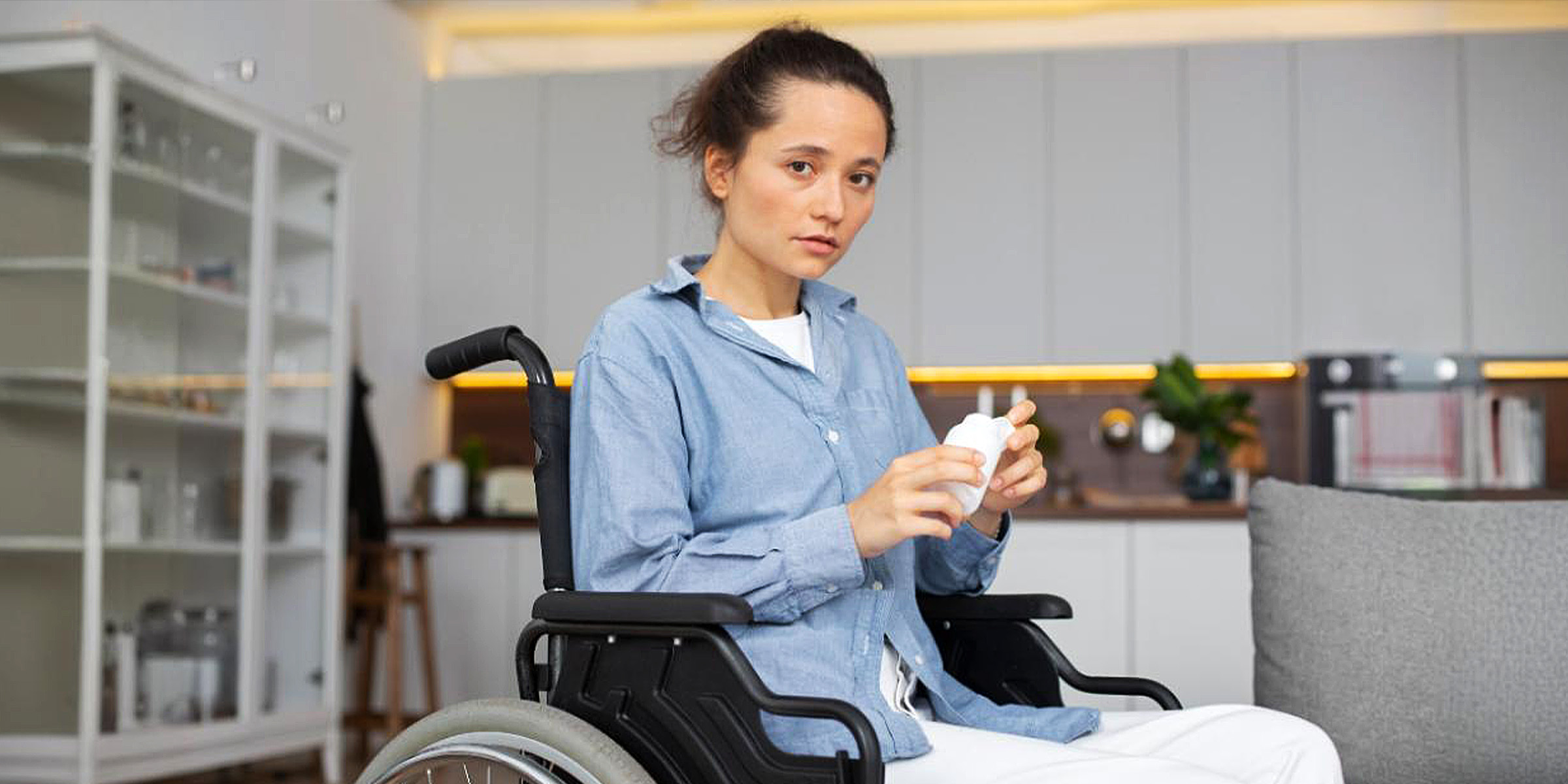 A woman in a wheelchair | Source: Freepik