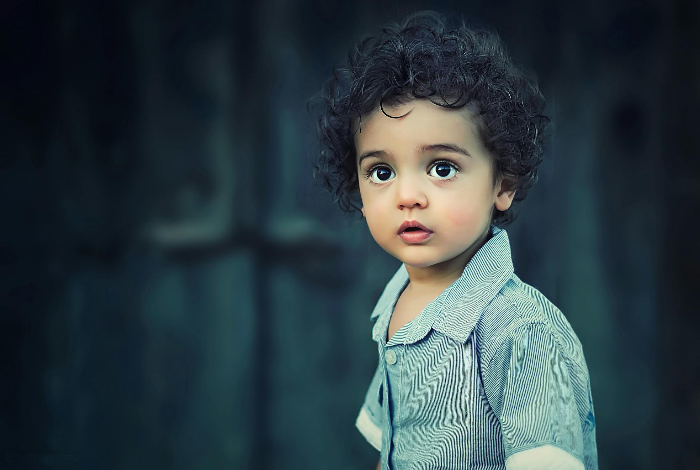 A serious boy in a shirt | Source: Pexels