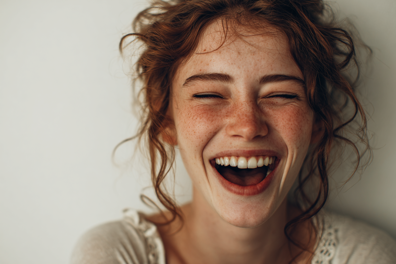A woman laughing | Source: Midjourney