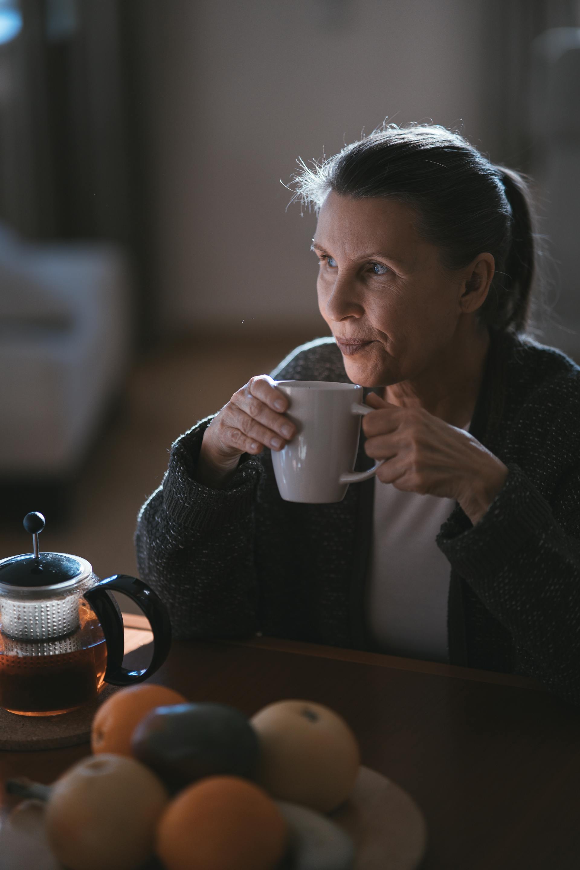 A woman drinking coffee | Source: Pexels