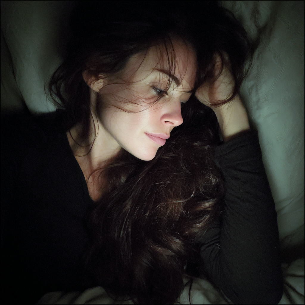 A woman laying in her bed | Source: Midjourney
