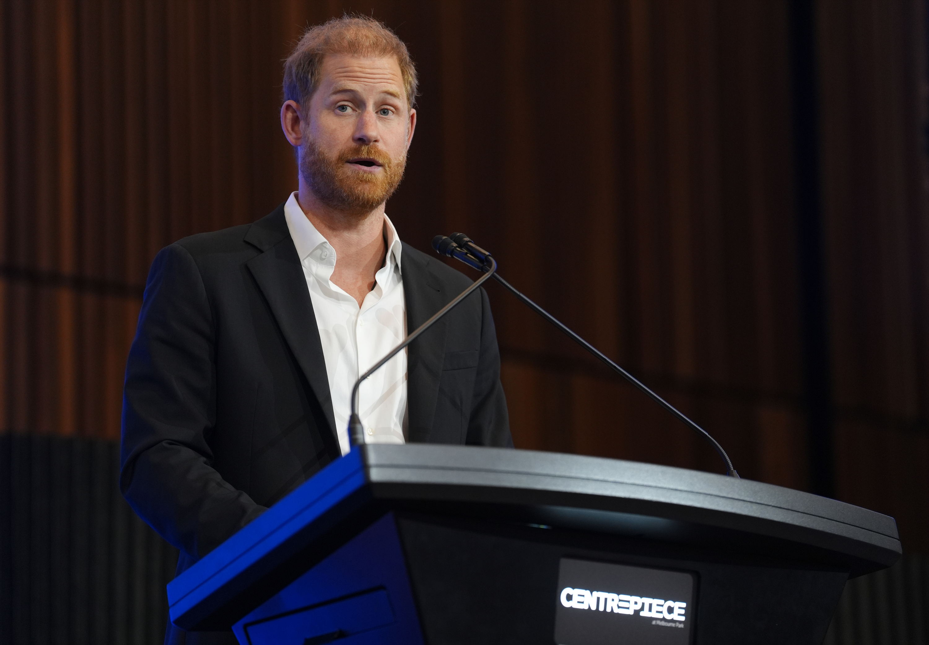 Prince Harry, Duke of Sussex delivers the keynote speech at the InterEdge Summit on day three of the royal trip at Centrepiece in Melbourne Park on April 16, 2026 in Melbourne, Australia. | Source: Getty Images