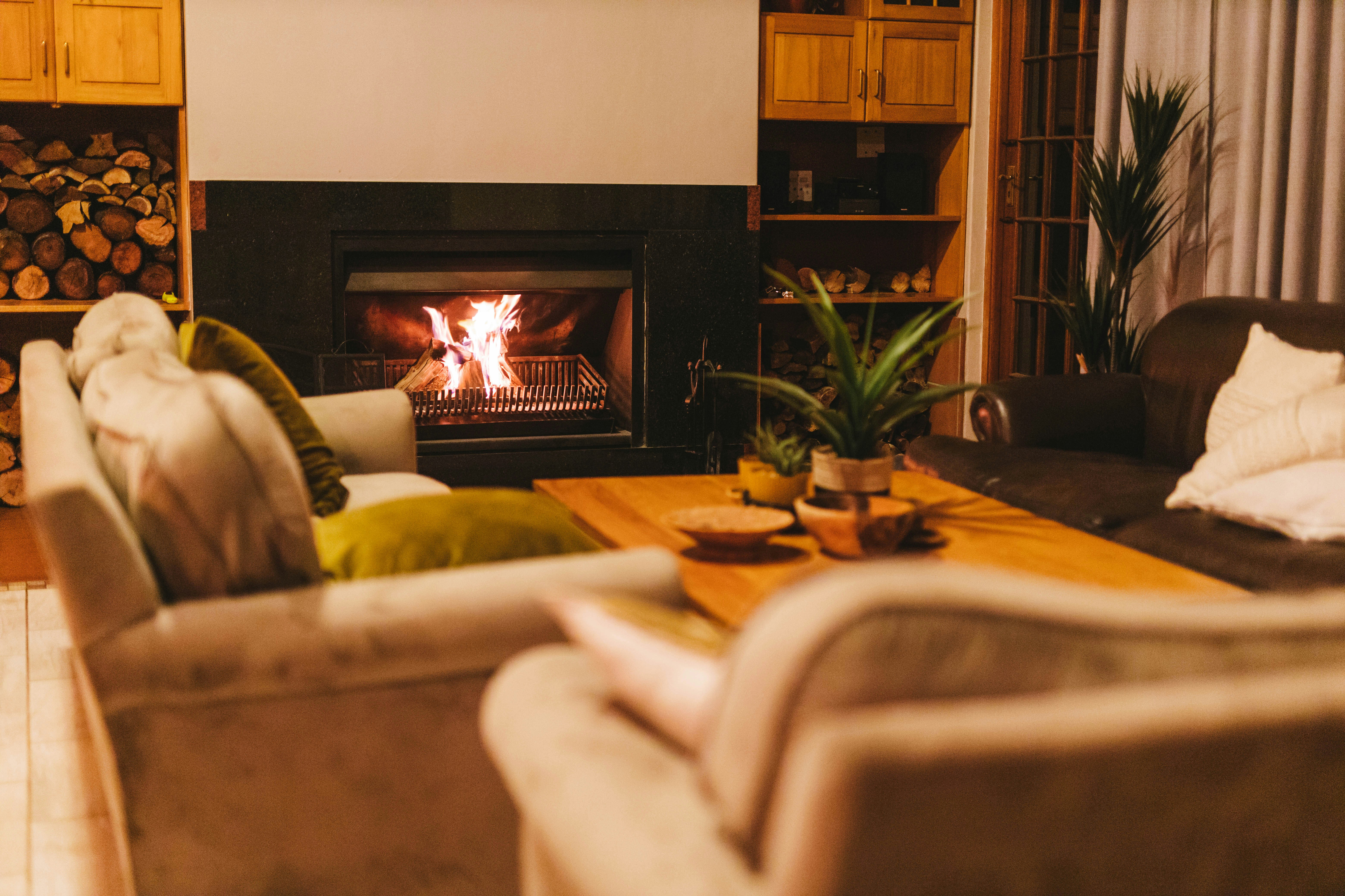 A fireplace in a living room | Source: Unsplash