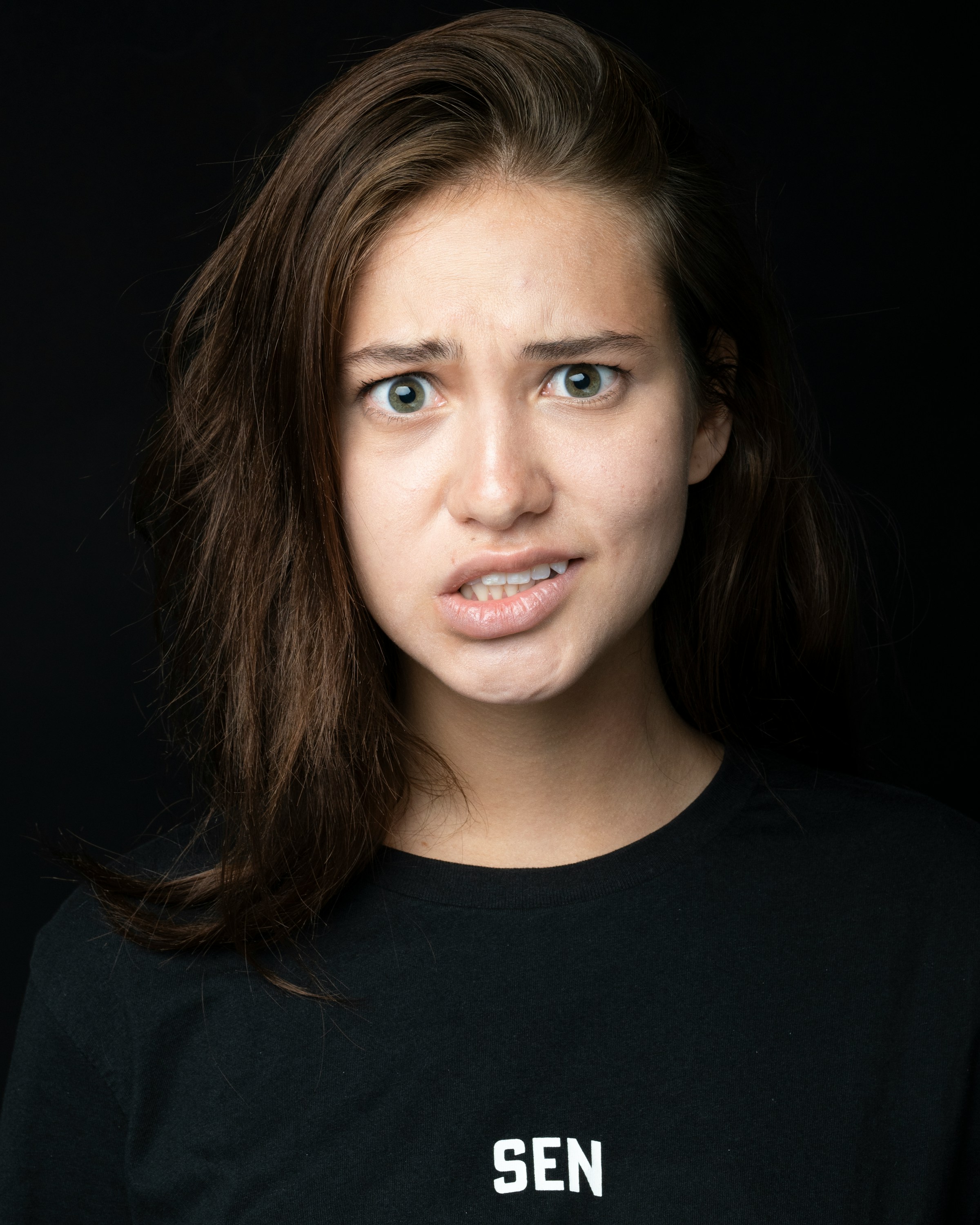 A woman pulling a face | Source: Unsplash