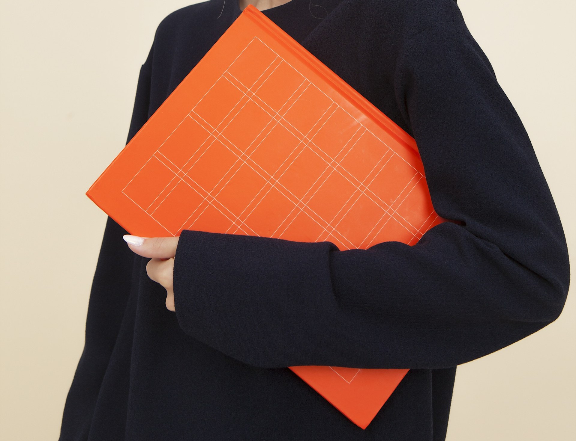 A woman holding a folder | Source: Unsplash