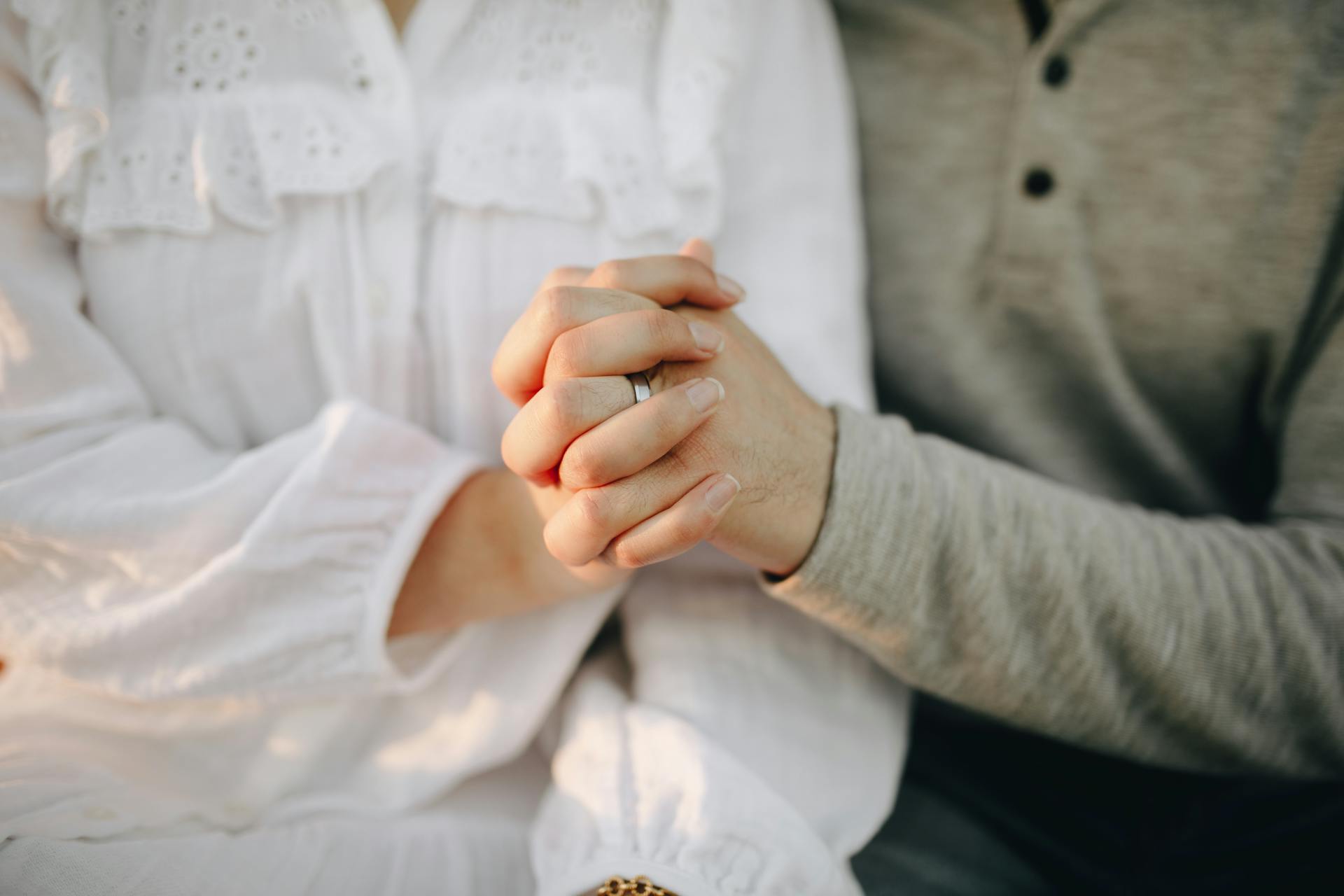 A woman holding her husband's hand | Source: Pexels