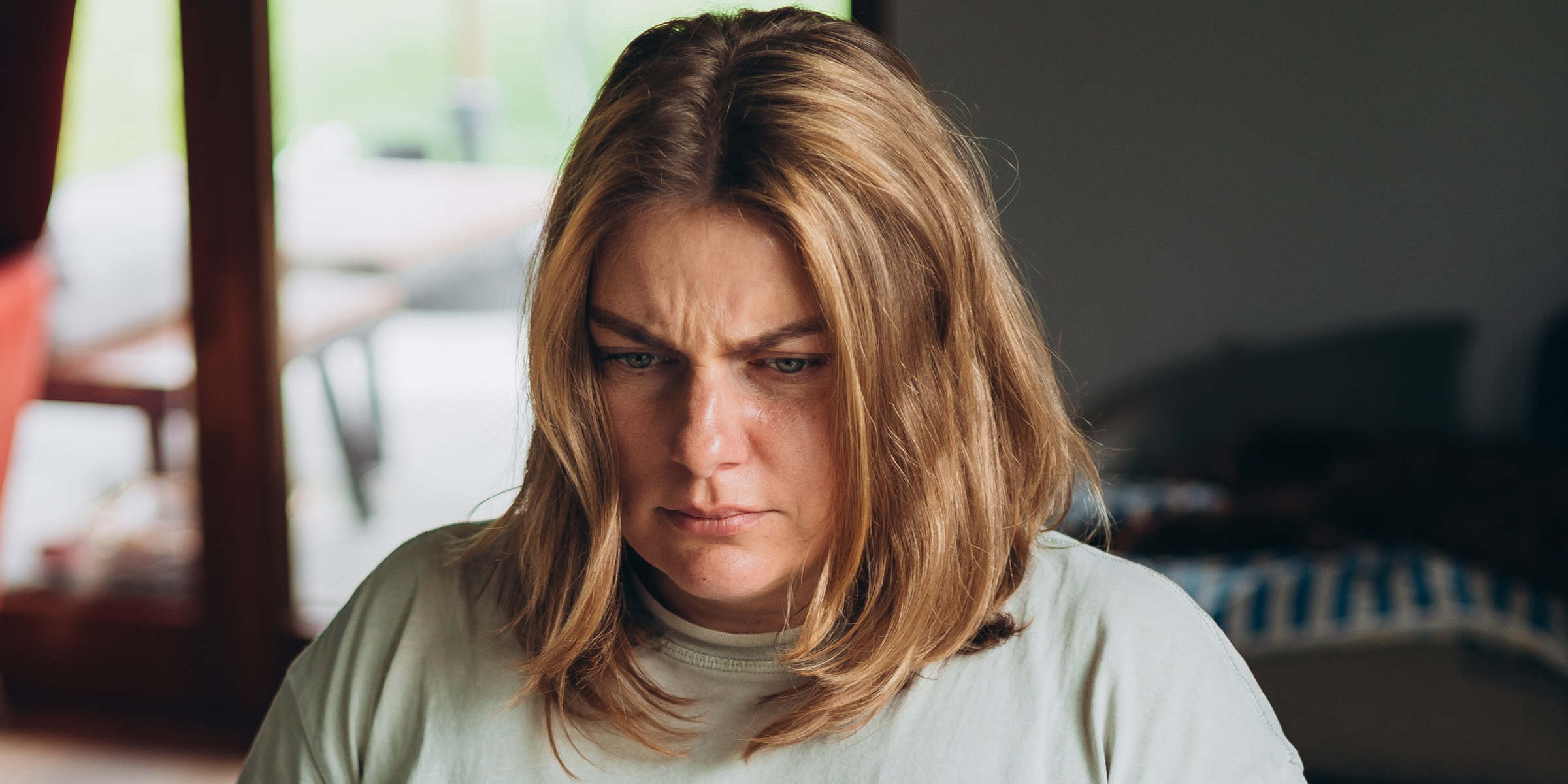 A frowning woman | Source: Shutterstock