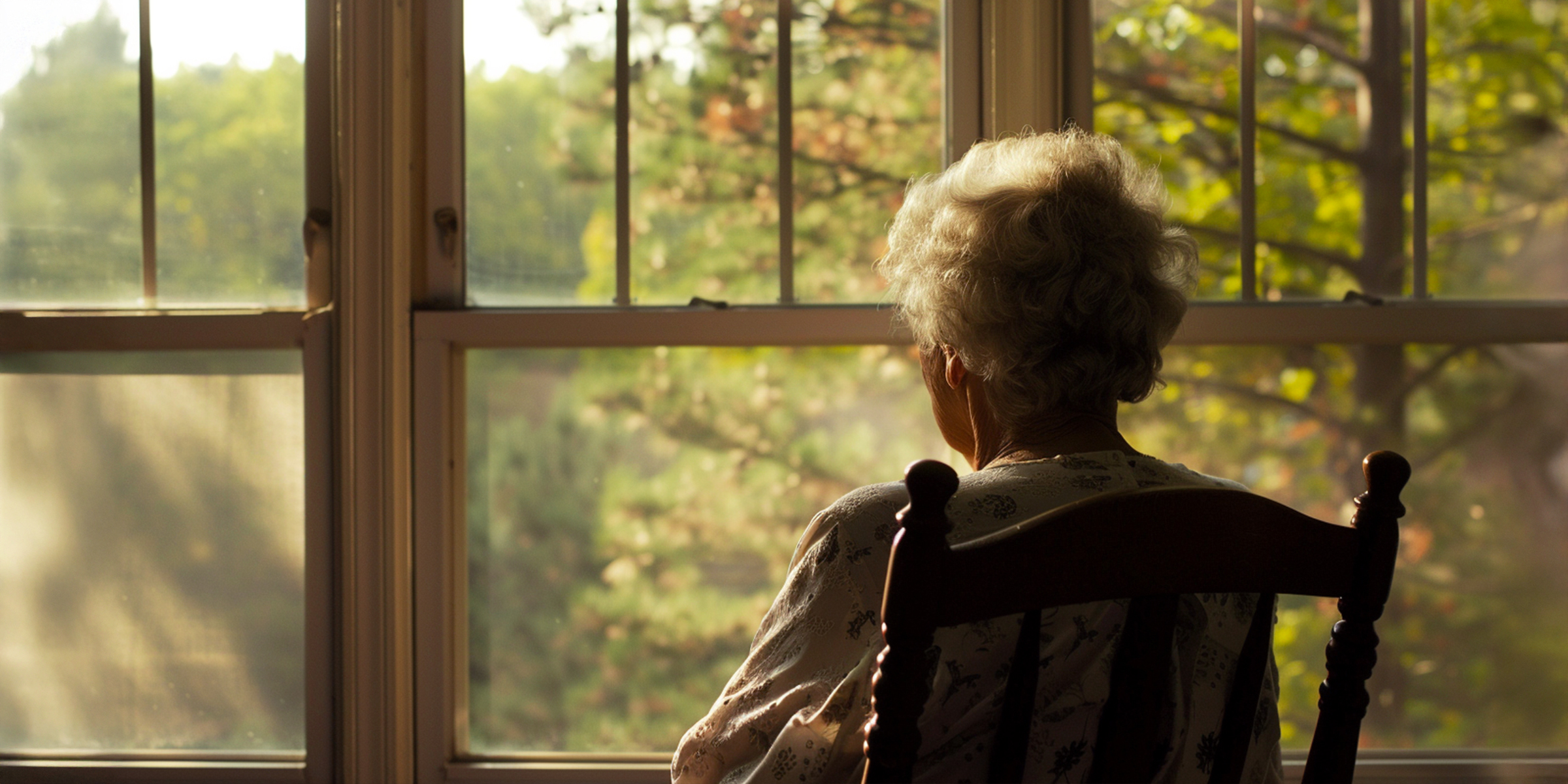 Elderly woman looking at the window | Source: Midjourney