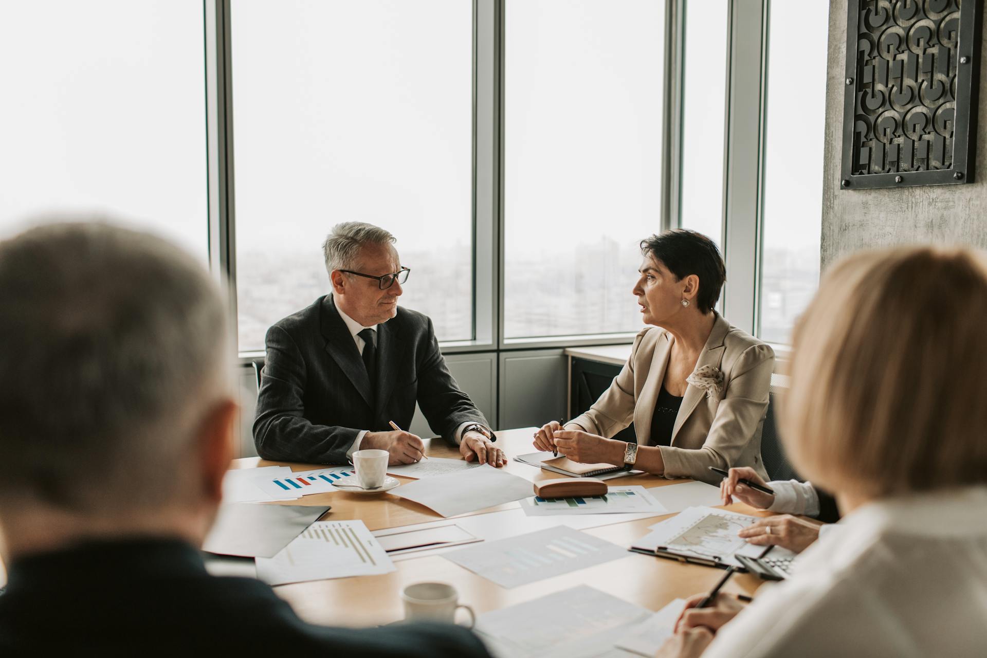 Businesspeople in a boardroom | Source: Pexels