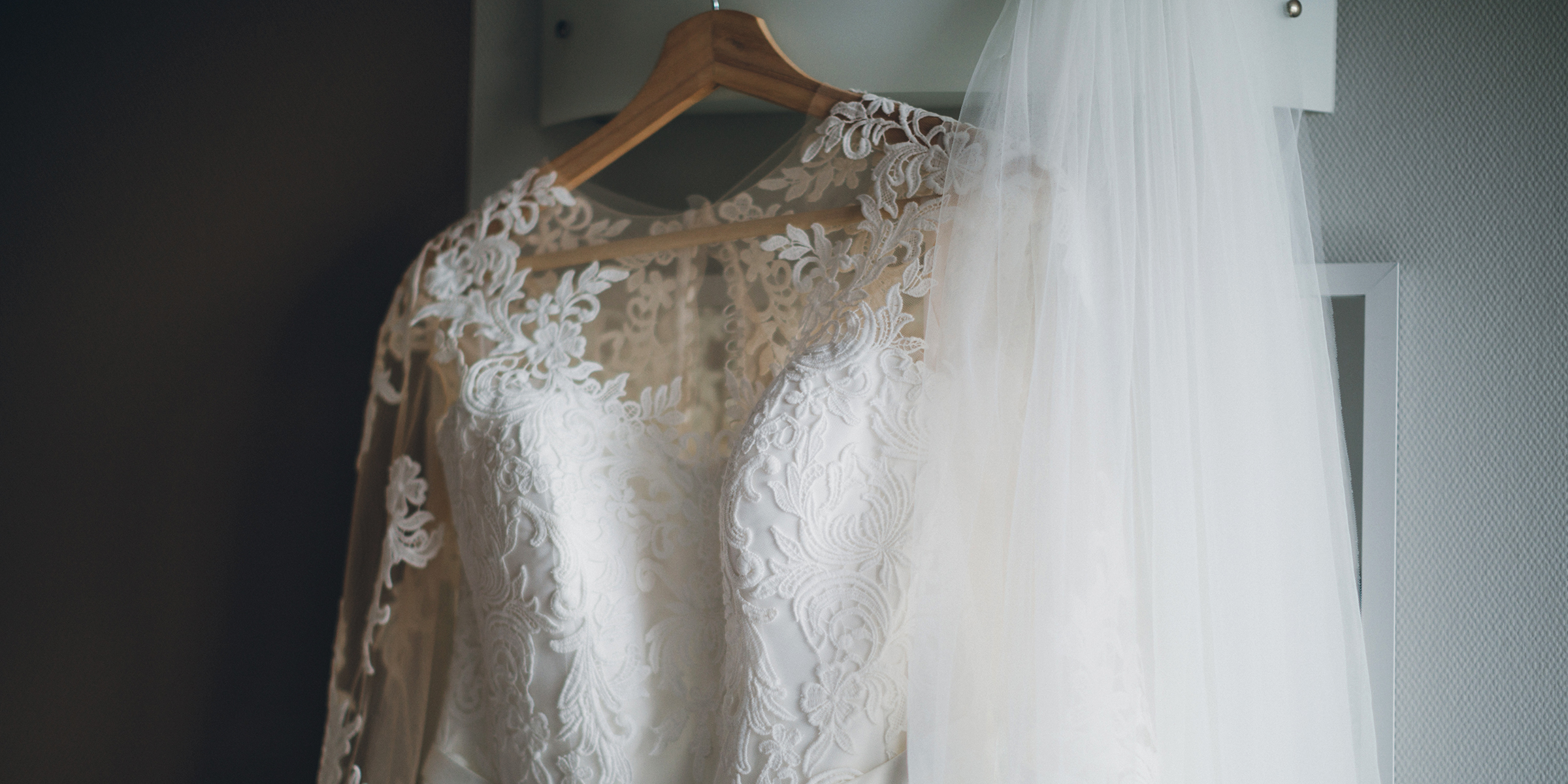 A wedding hanging by a door frame | Source: Shutterstock