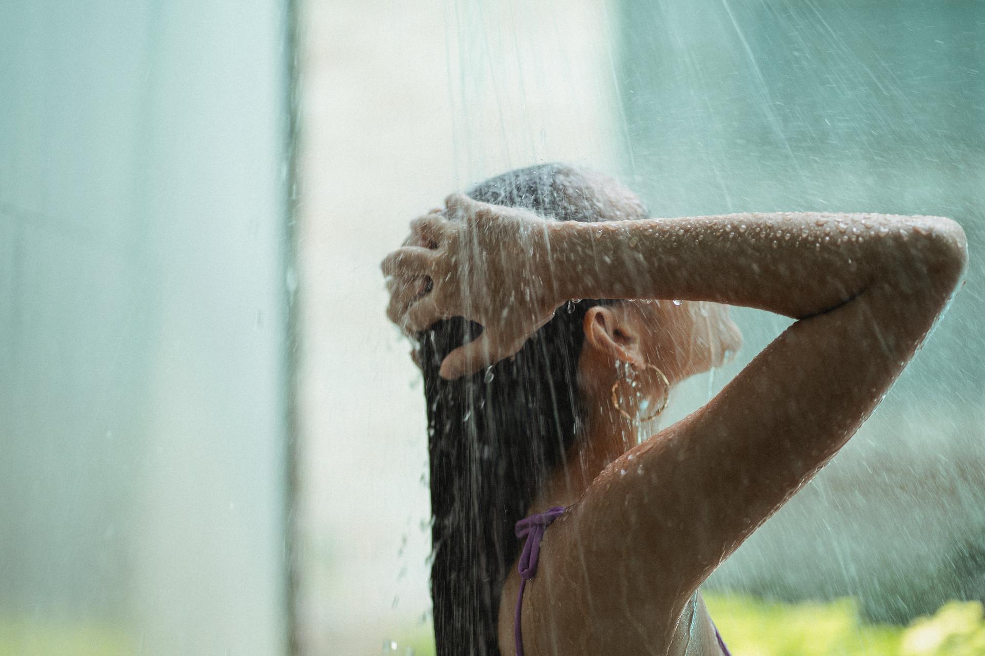 A woman taking a shower | Source: Pexels