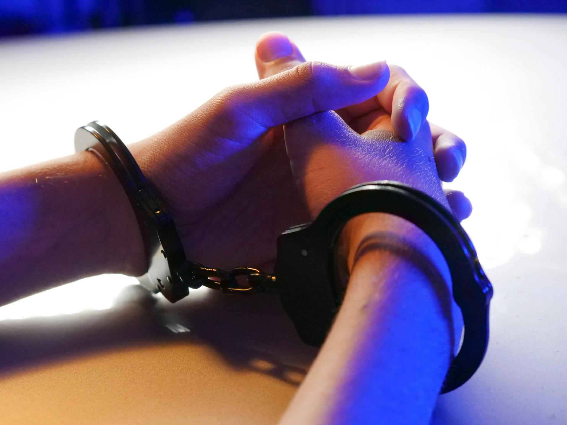 A person in handcuffs | Source: Pexels