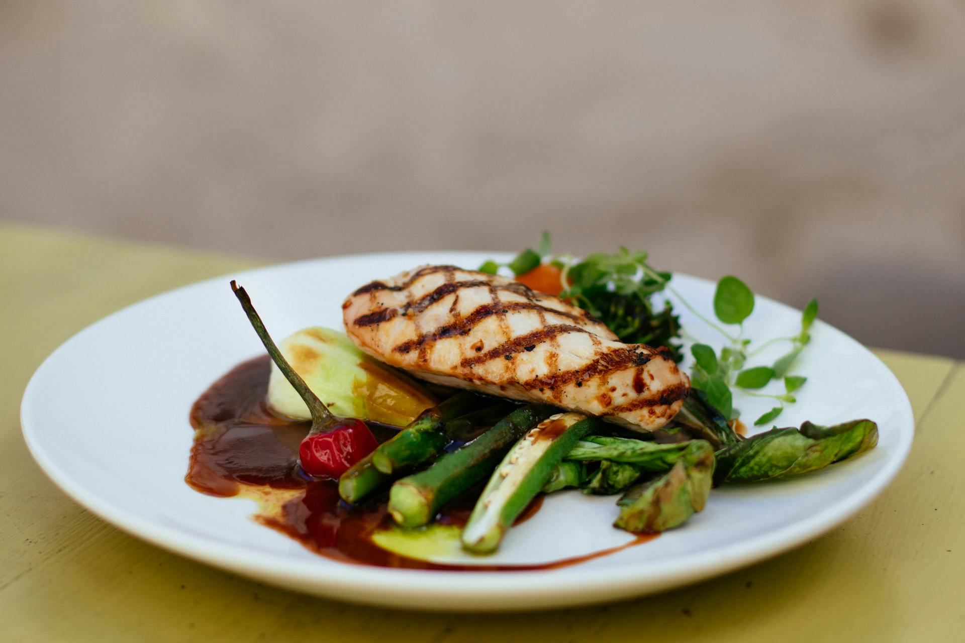 A grilled chicken dinner | Source: Pexels
