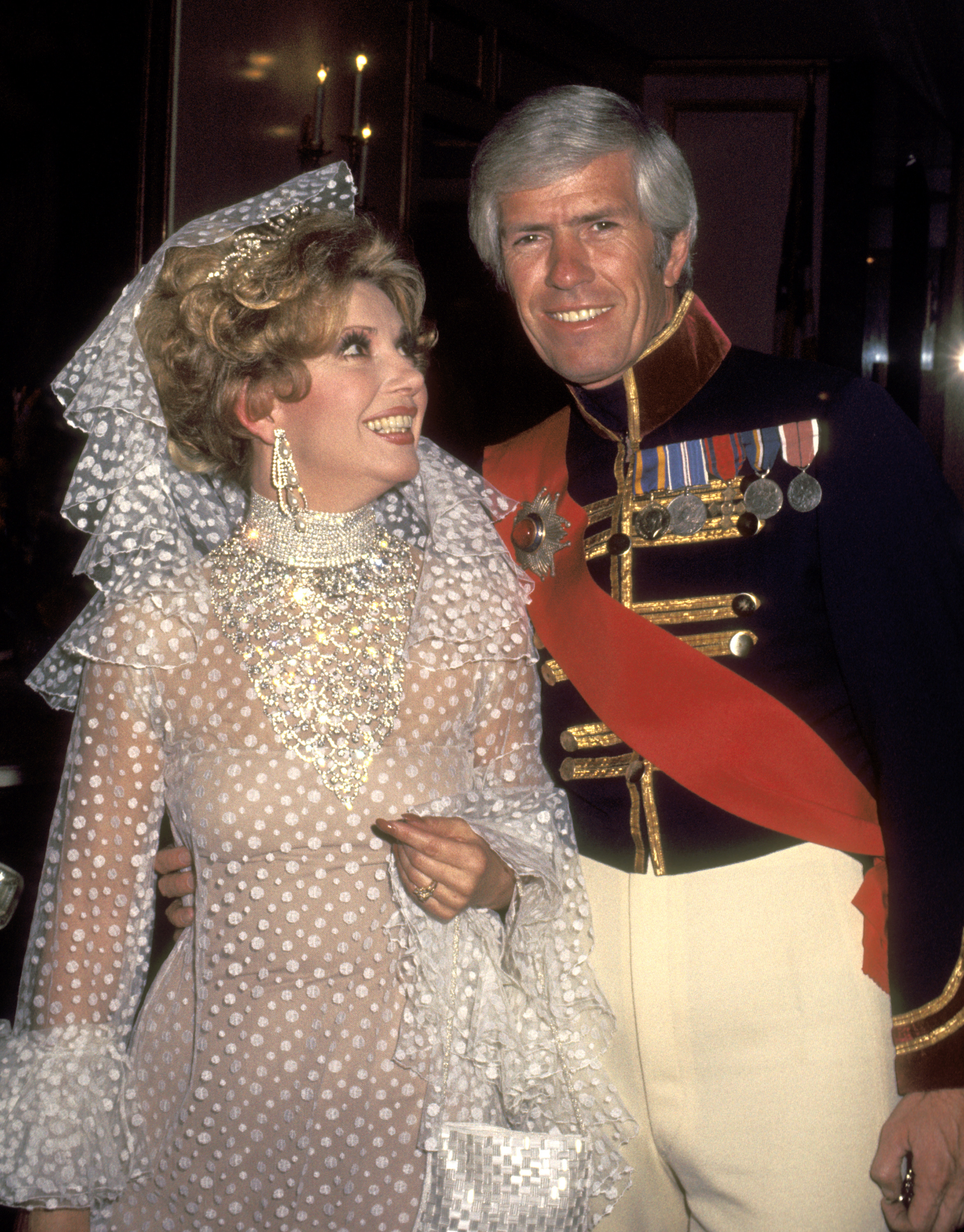 The actress pictured with her husband on February 13, 1977 | Source: Getty Images