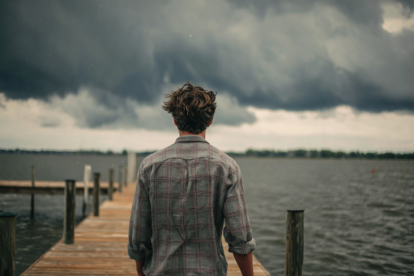 A man walking toward the dock | Source: Midjourney