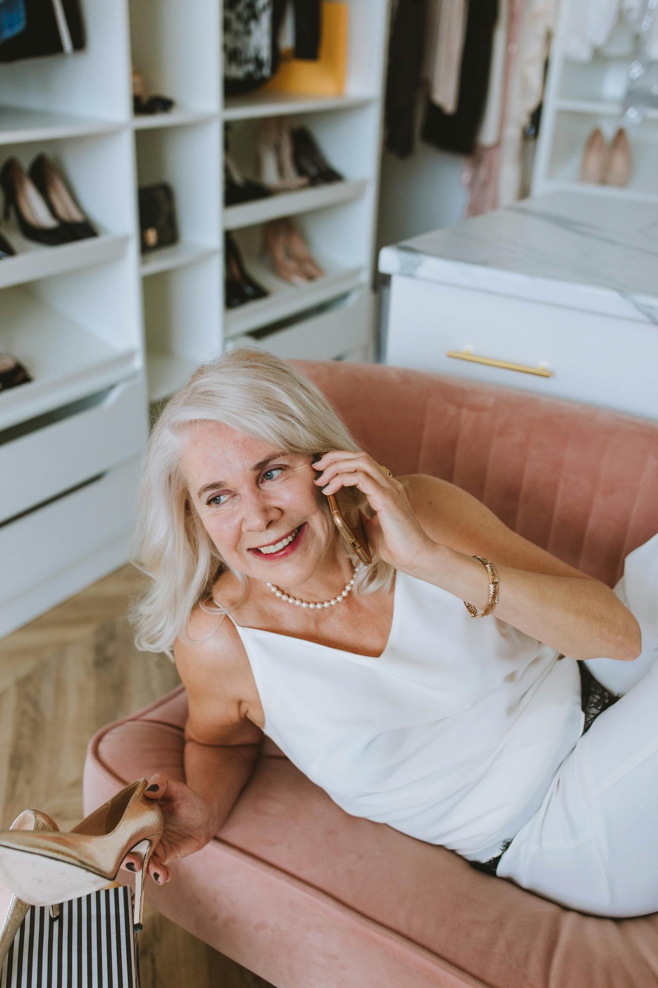 A delighted senior woman talking on the phone | Source: Pexels