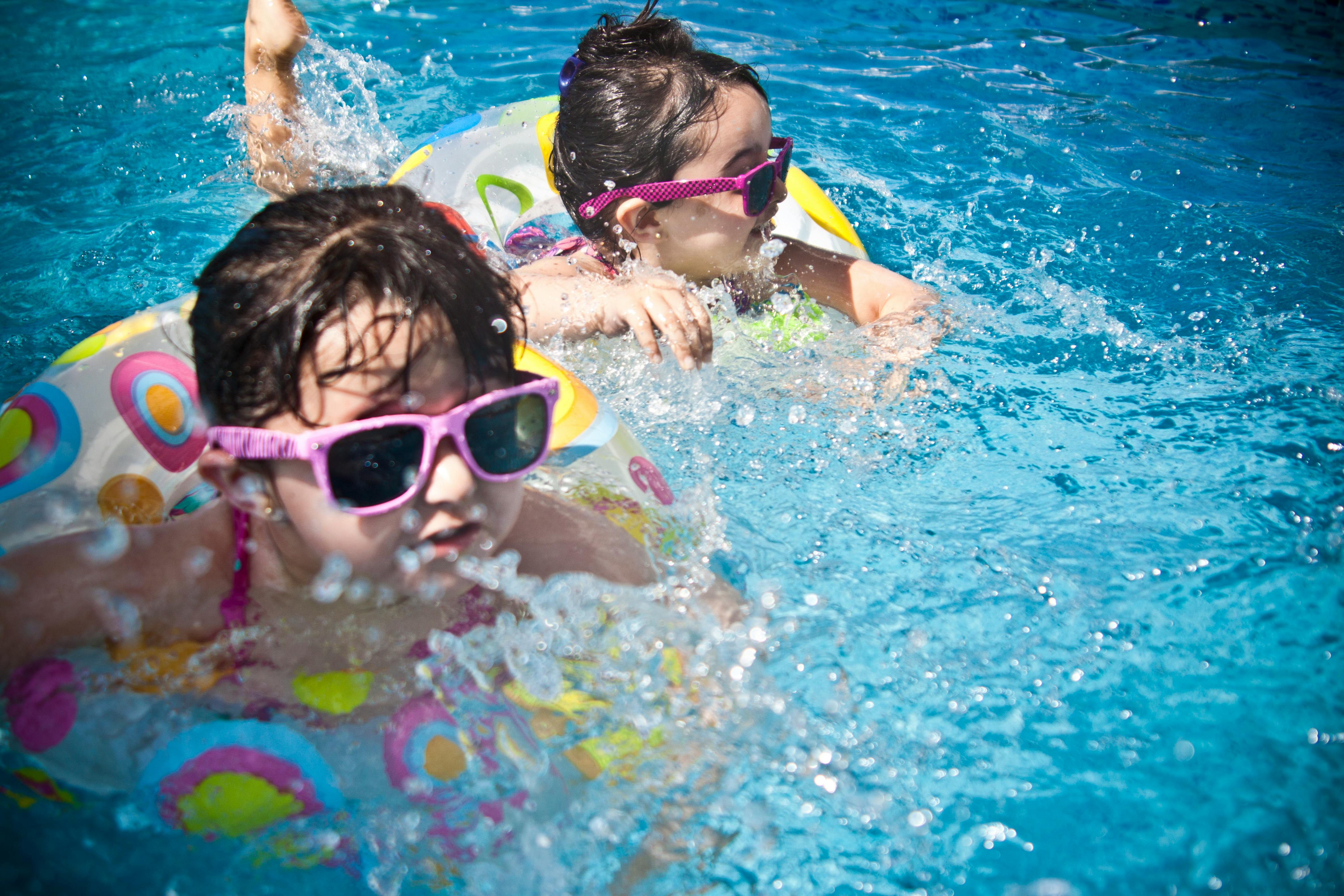 Kids swimming | Source: Pexels