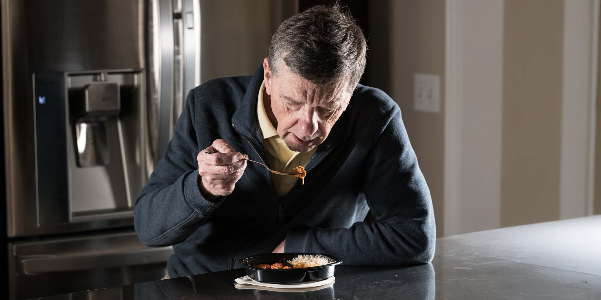 A man eating at home | Source: Shutterstock