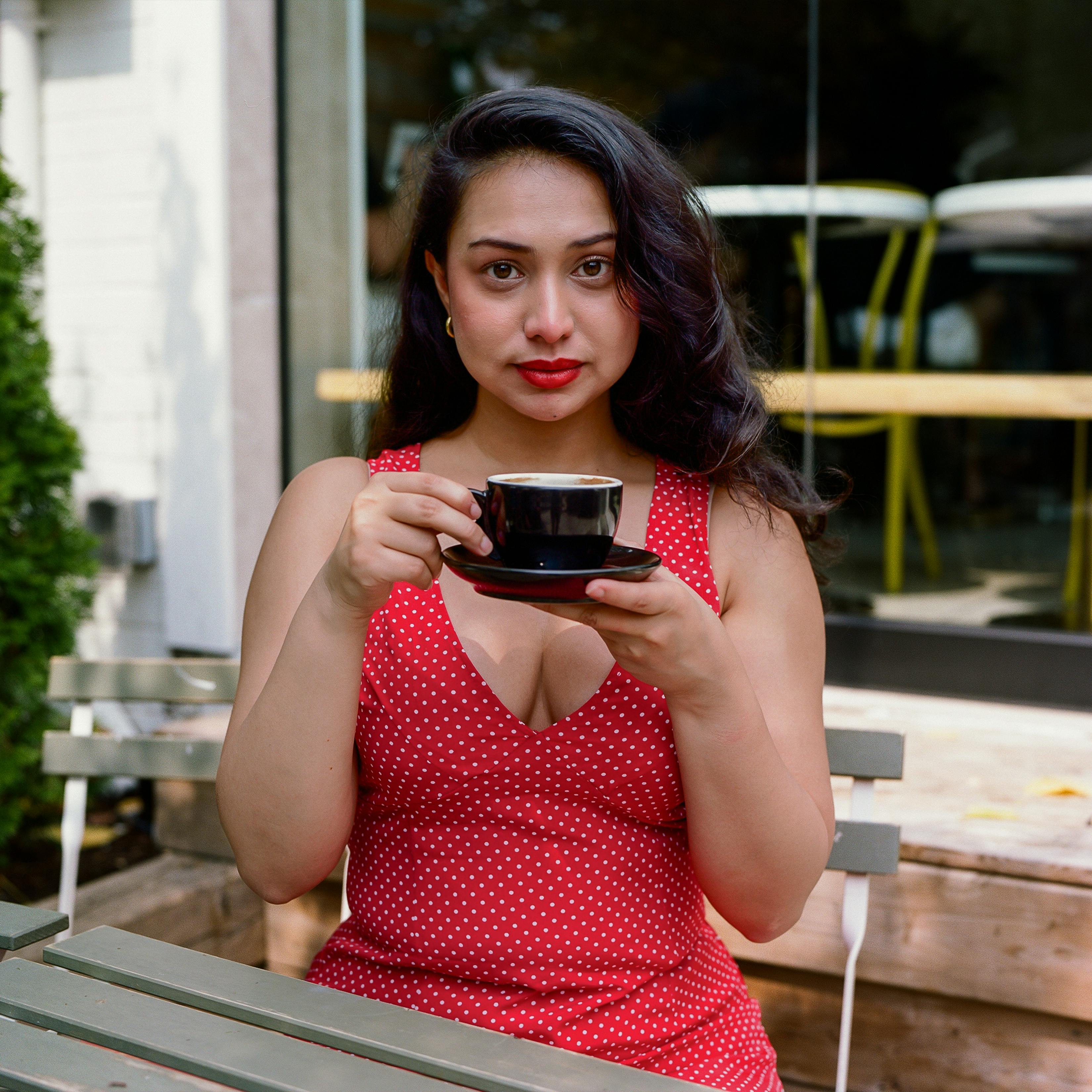 Woman drinking coffee | Source: Pexels