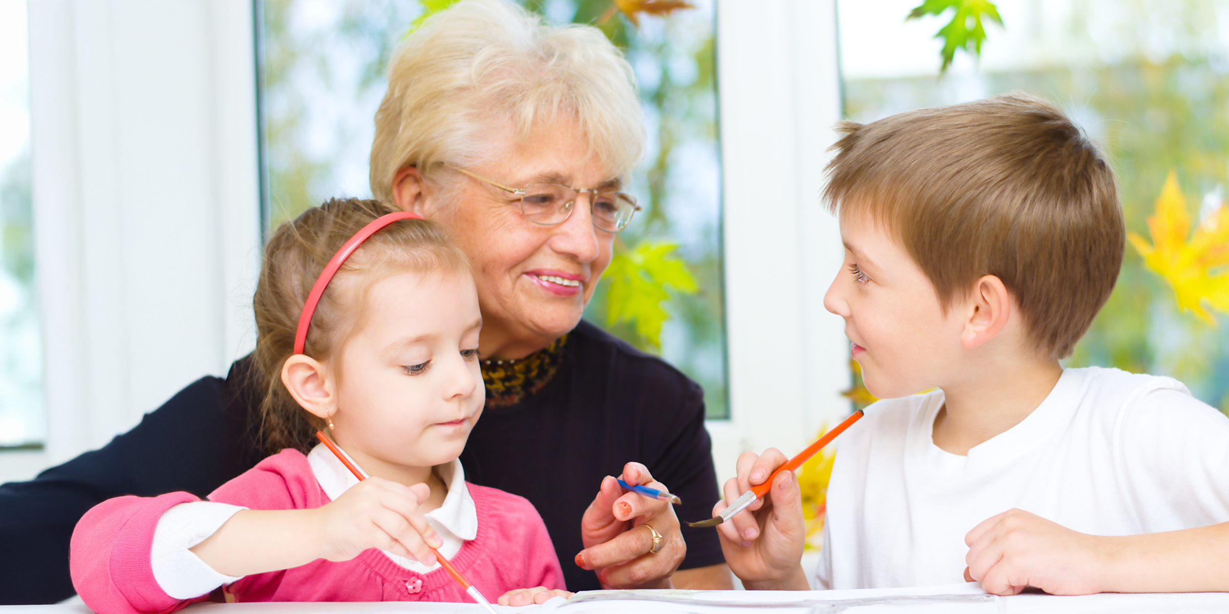 A woman with her grandkids | Source: Shutterstock