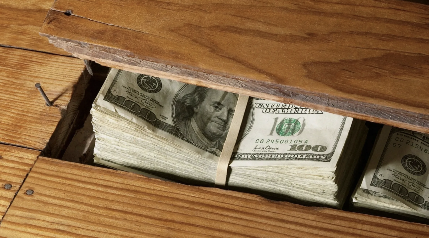 Money under the floor | Source: Shutterstock