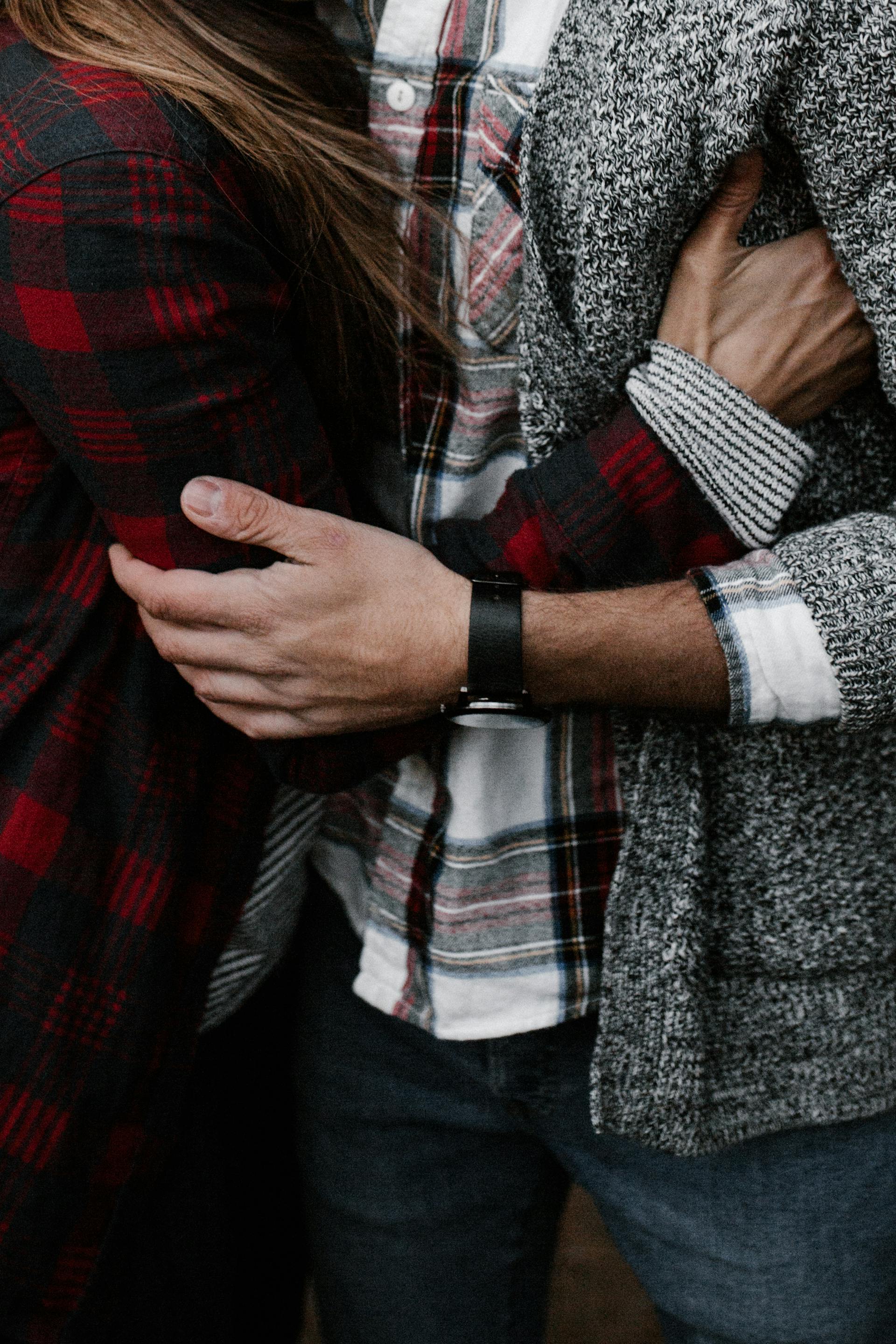 A close-up shot of a couple hugging | Source: Pexels