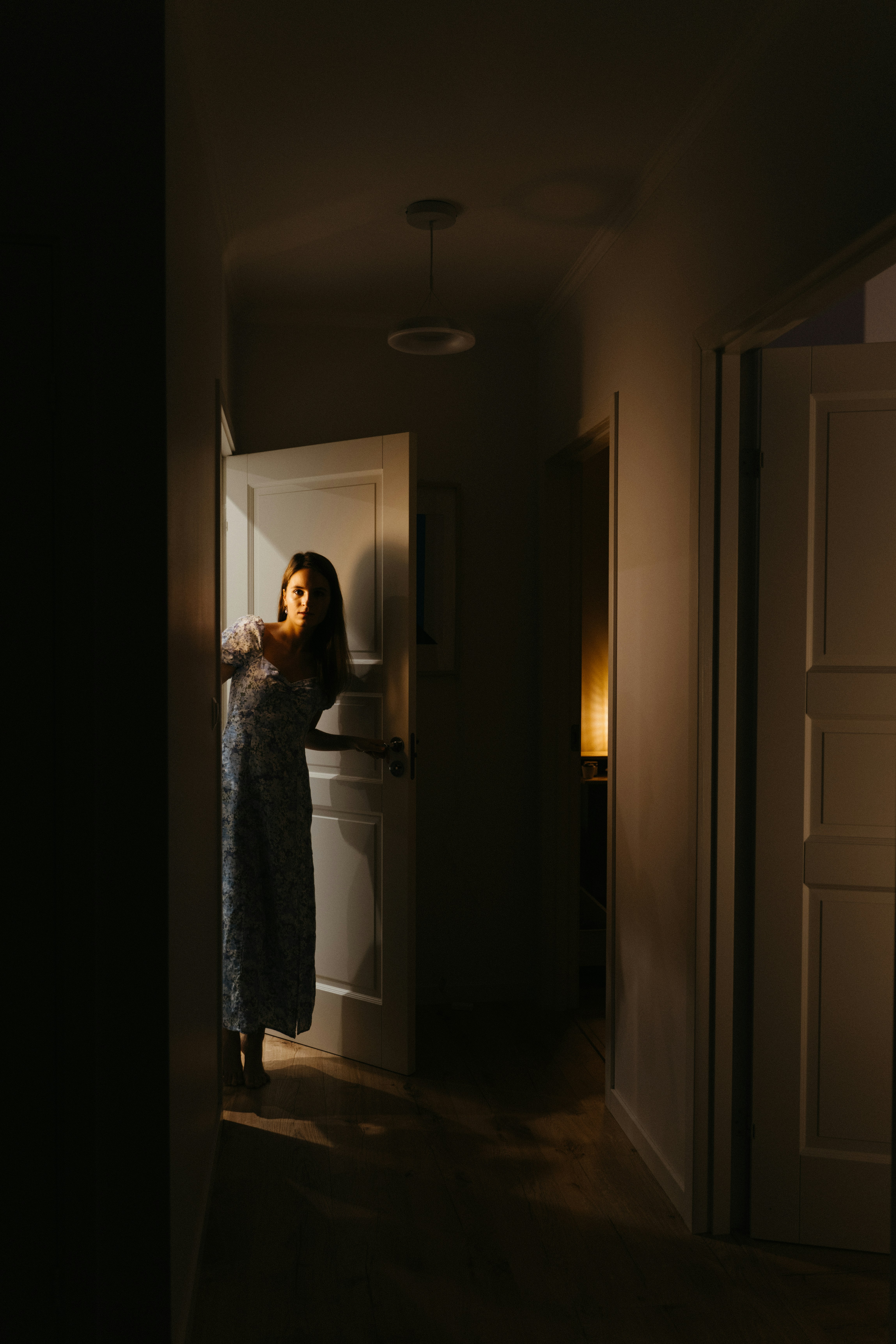 A woman eavesdropping | Source: Unsplash