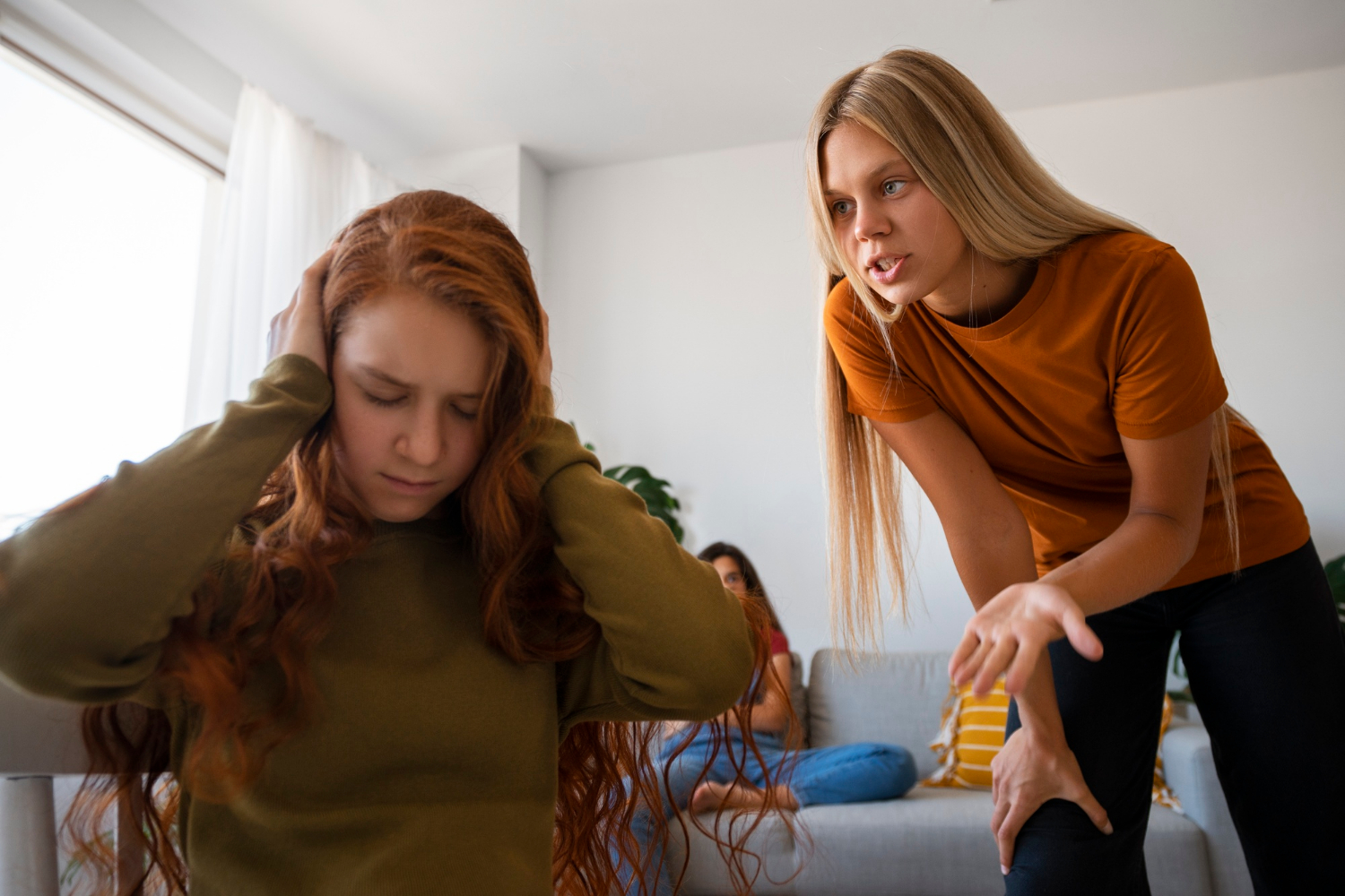 A girl criticizing another young girl | Source: Freepik