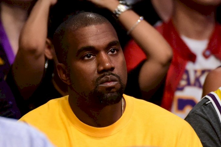 Kanye West looks on as he watches as the Los Angeles Lakers take on the Utah Jazz at Staples Center on April 13, 2016 in Los Angeles, California. | Photo by Harry How/Getty Images