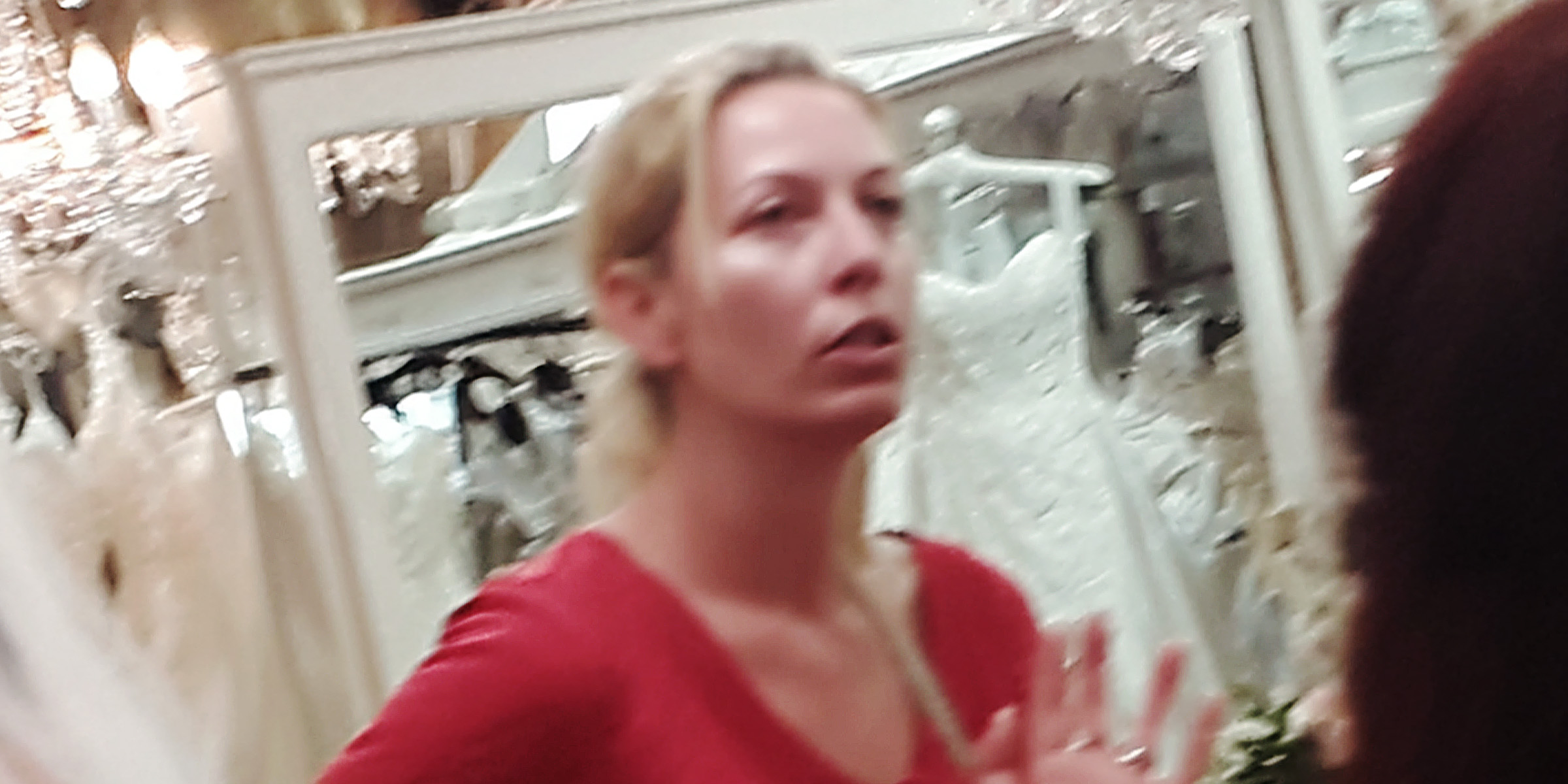 An anxious woman in a bridal boutique | Source: The Celebritist
