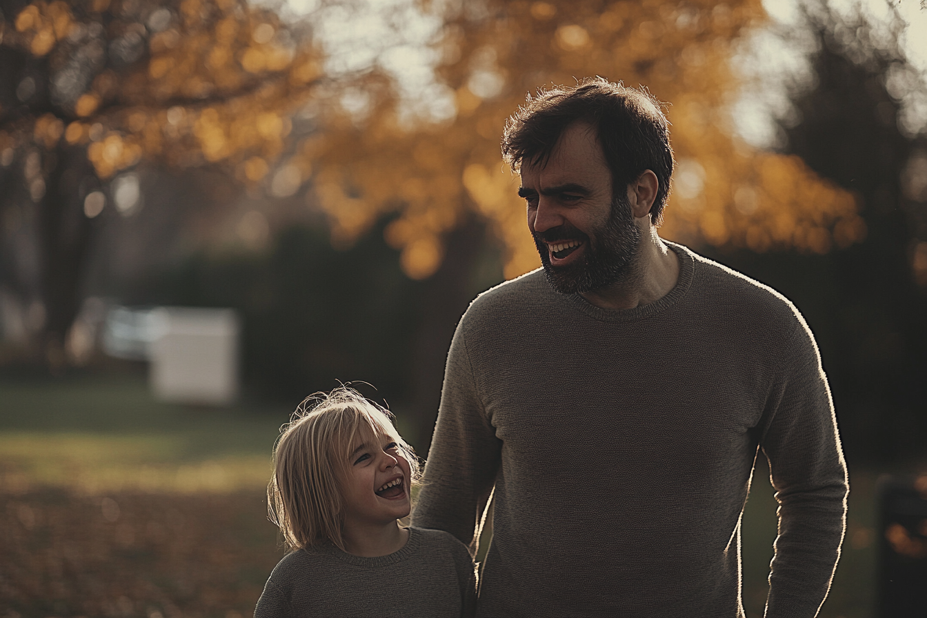 A man and daughter at the park | Source: Midjourney