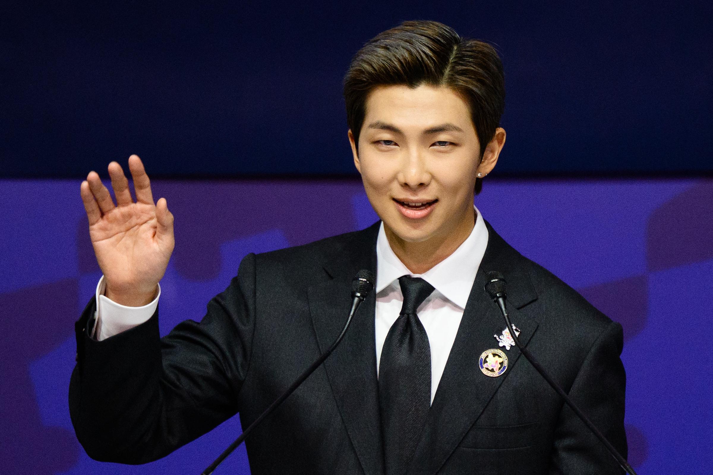 RM, member of K-pop boy band BTS, speaks during the Asia-Pacific Economic Cooperation (APEC) CEO Summit at the Gyeongju Arts Center in Gyeongju on October 29, 2025. | Source: Getty Images