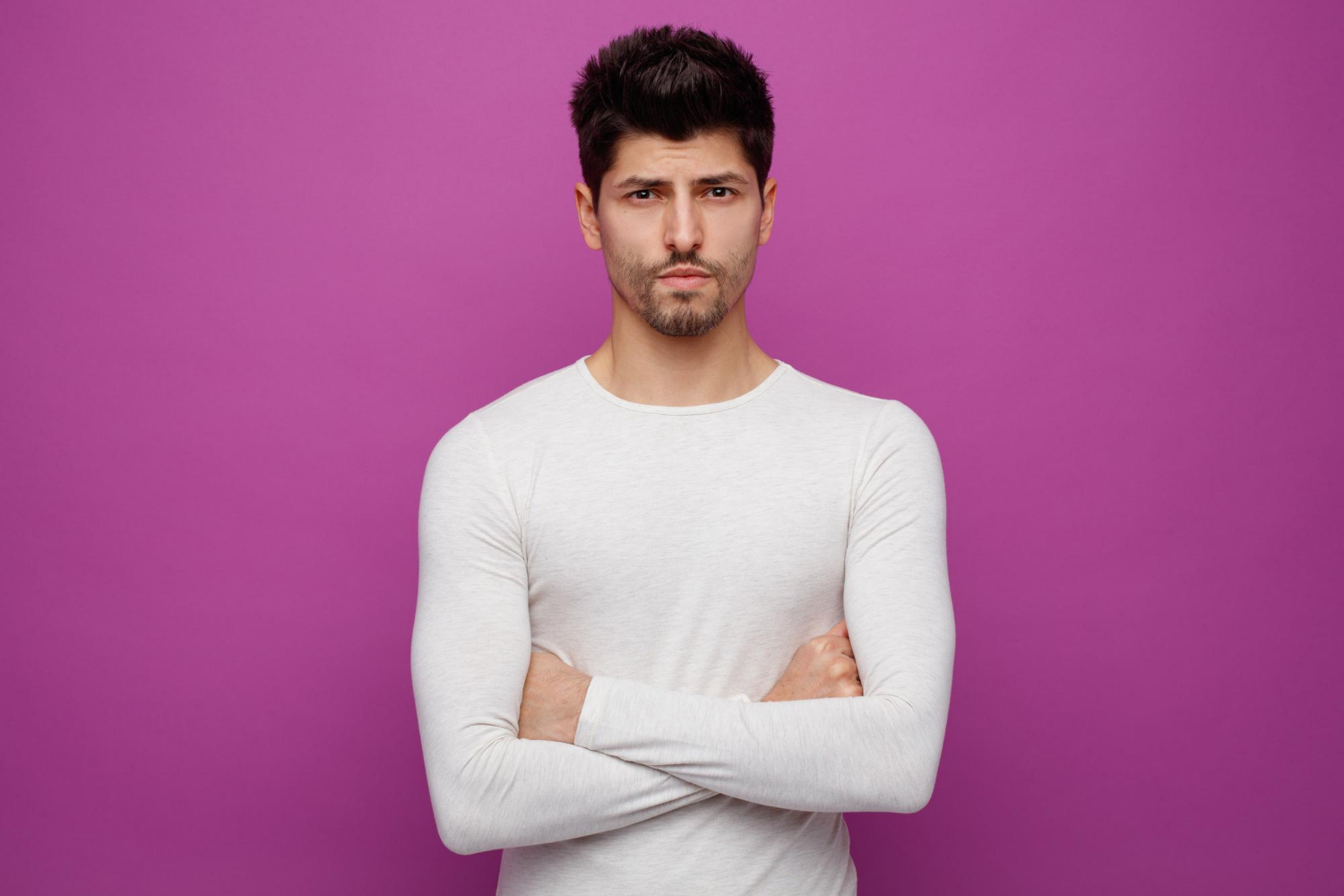 A man with his arms crossed | Source: Freepik