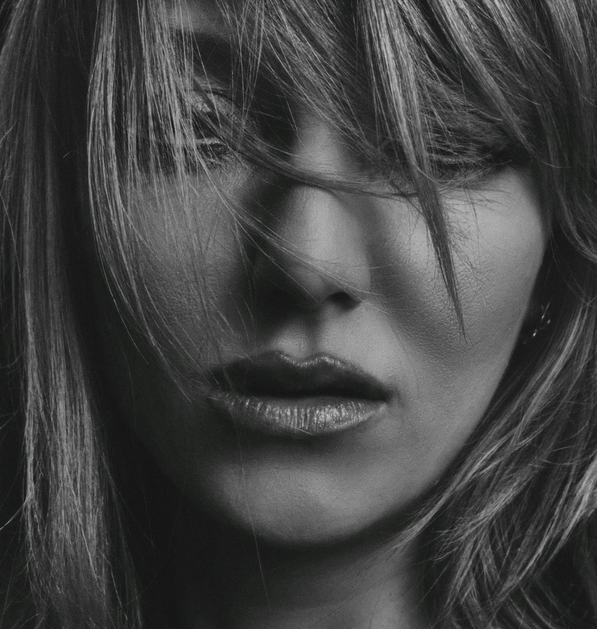 A grayscale photo of a woman's face | Source: Pexels