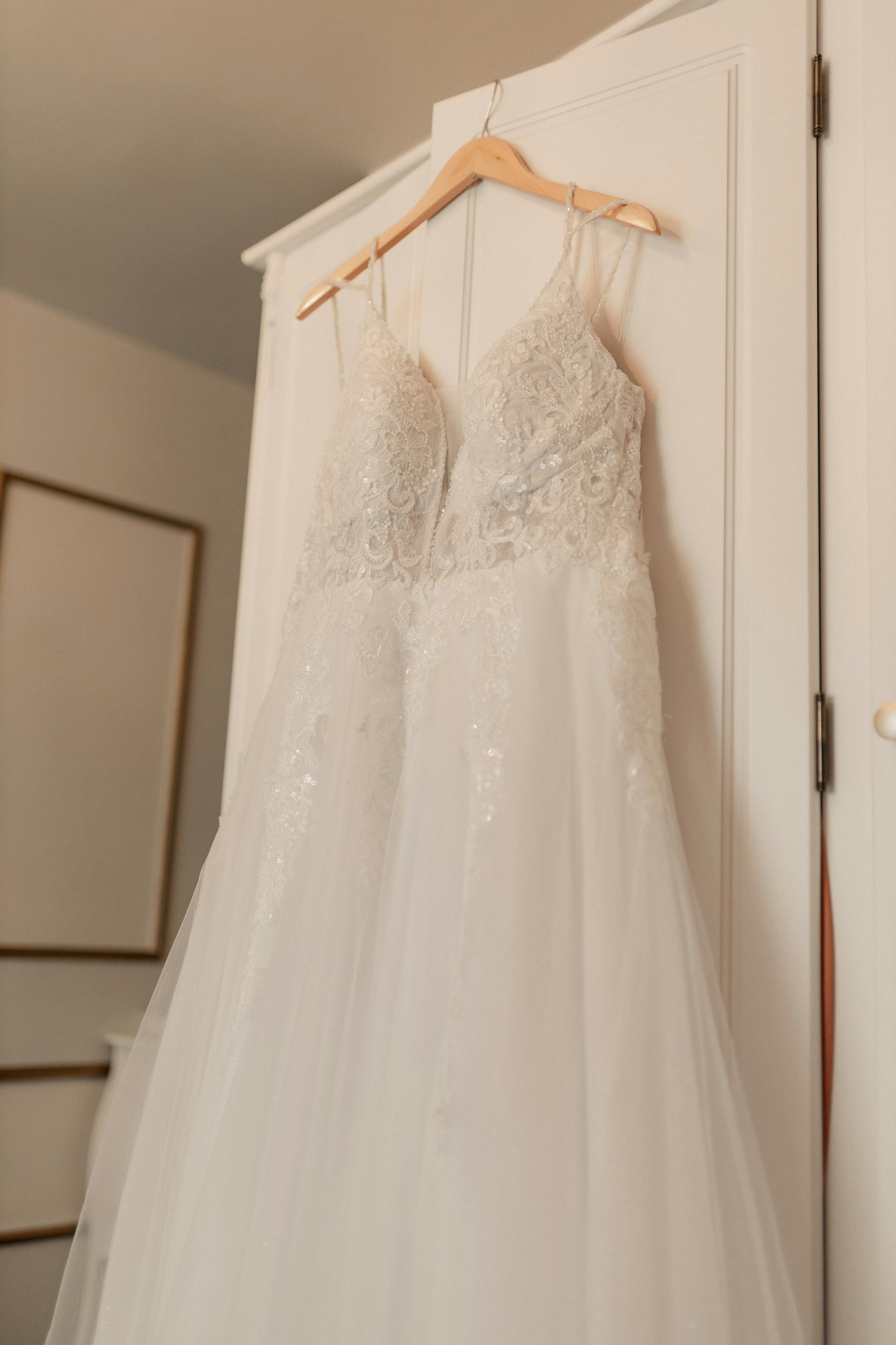 A wedding dress on a hanger | Source: Pexels