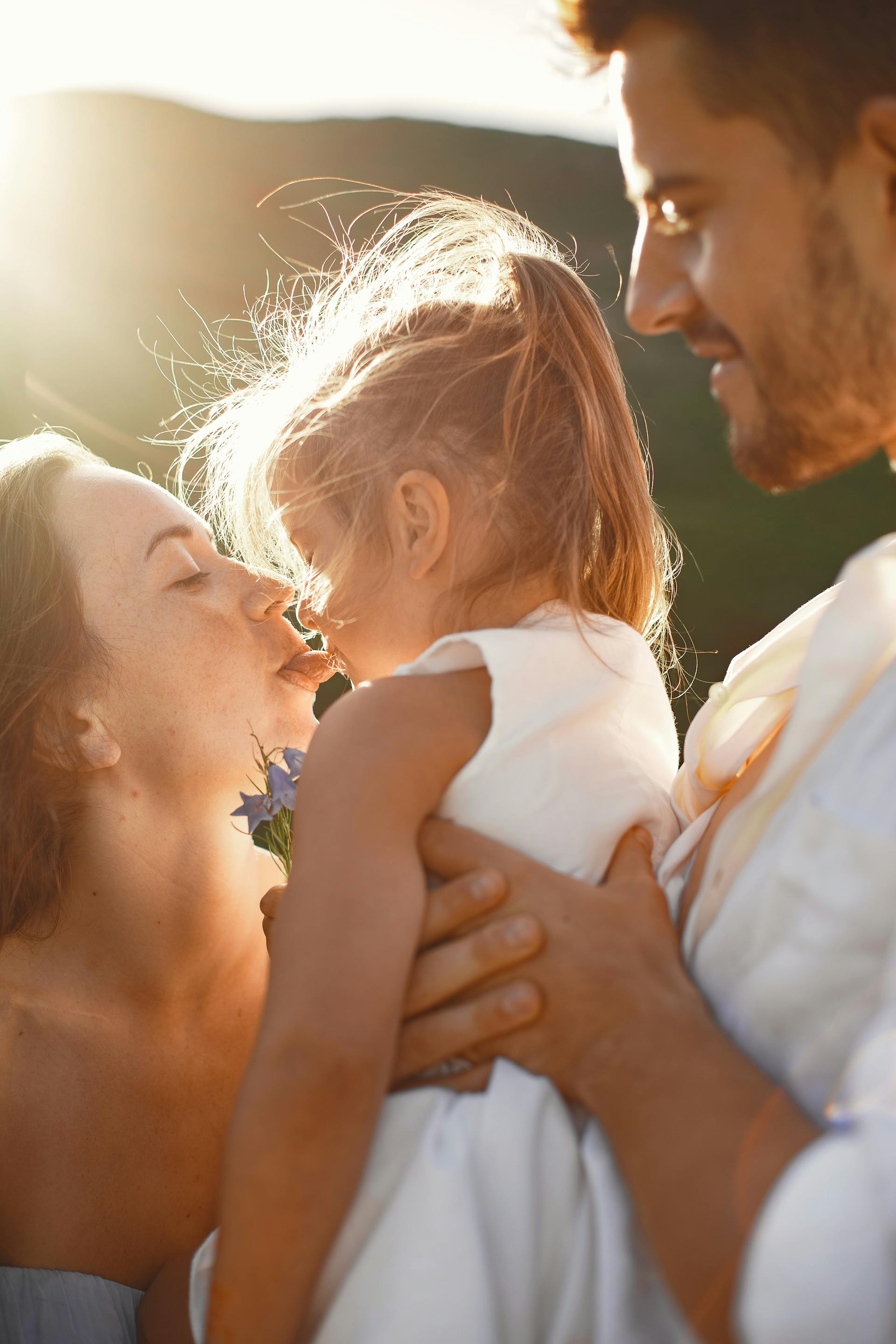 A couple with their little girl | Source: Pexels