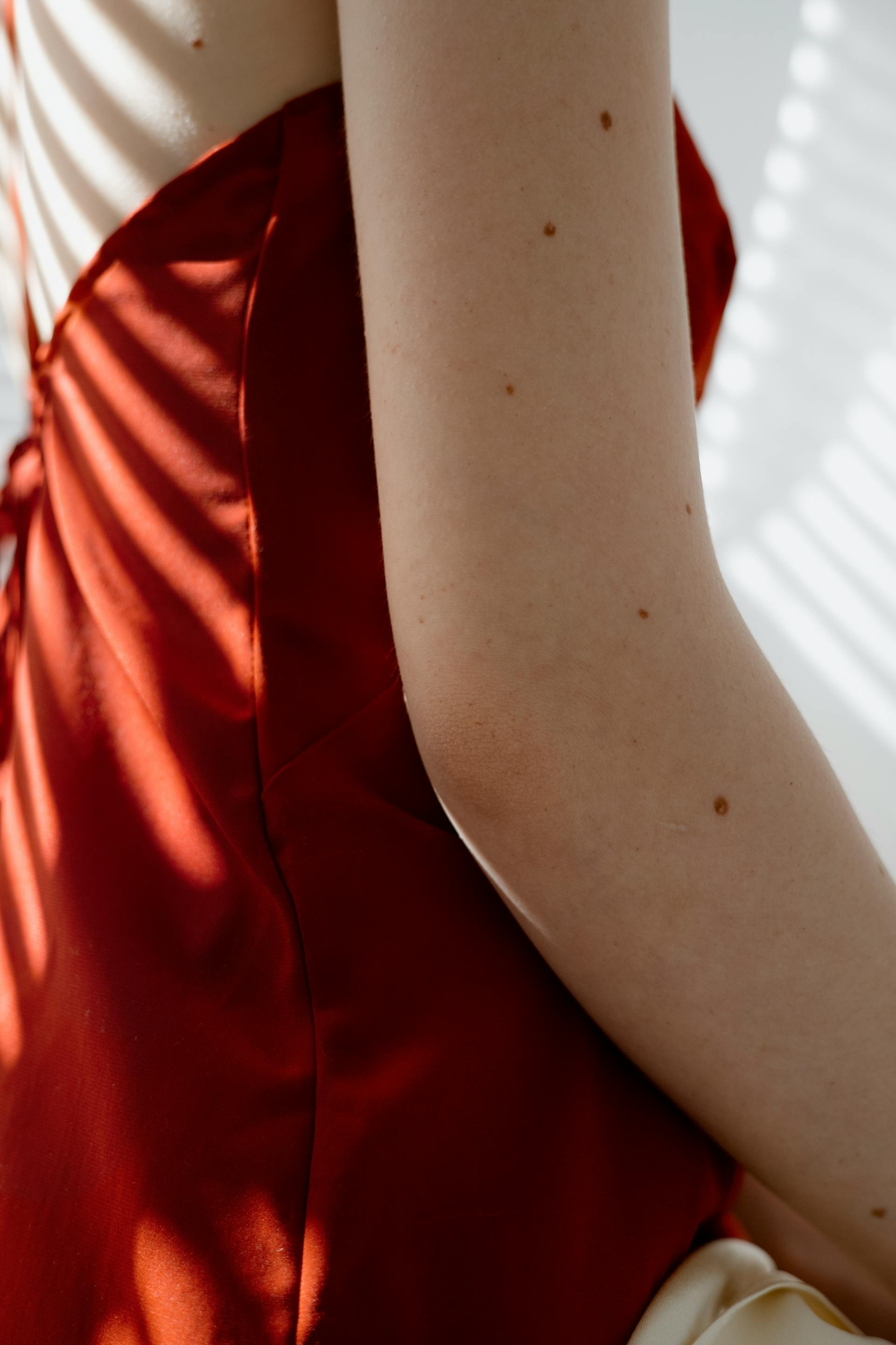 A woman in a red dress | Source: Pexels