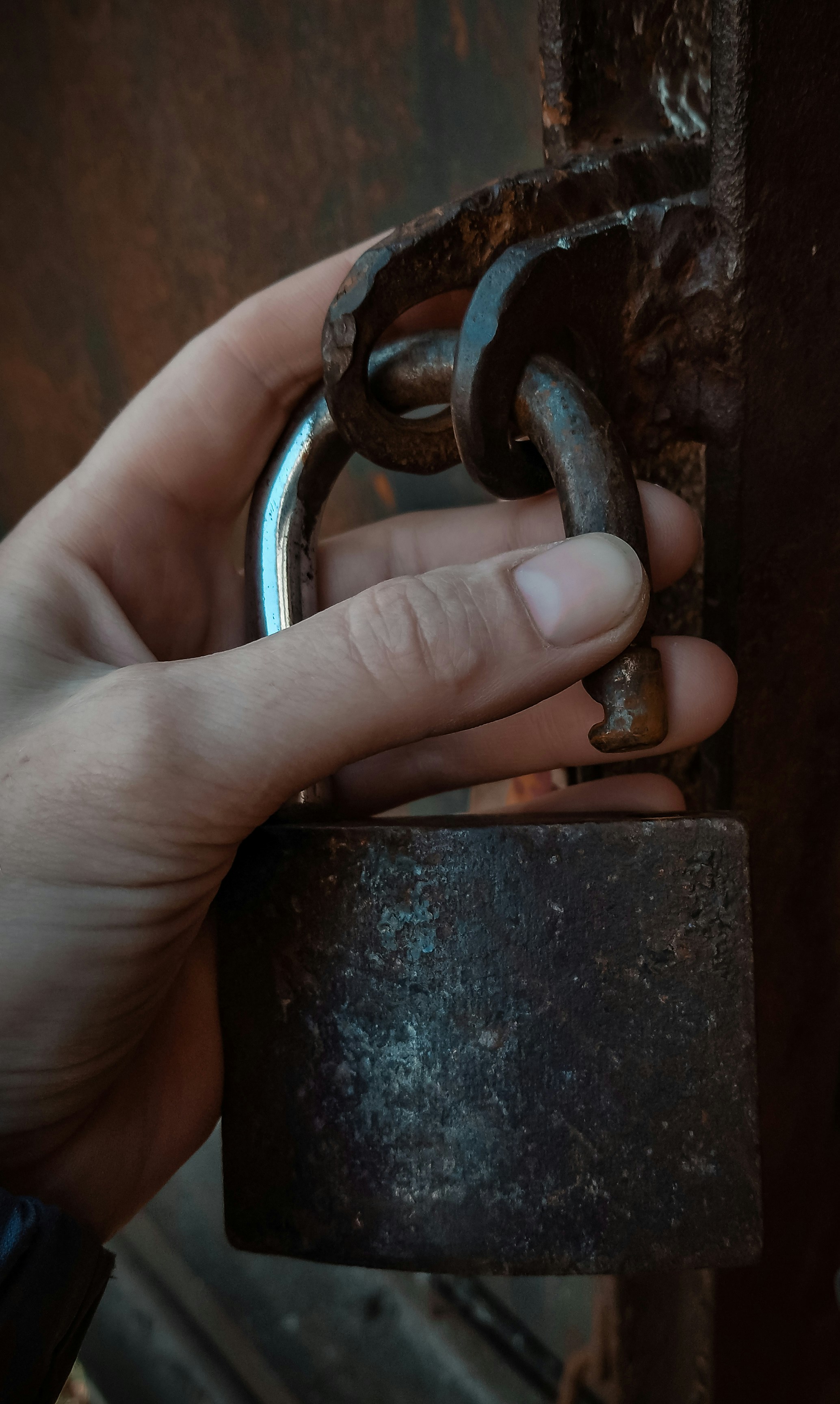 A woman holding a padlock | Source: Unsplash