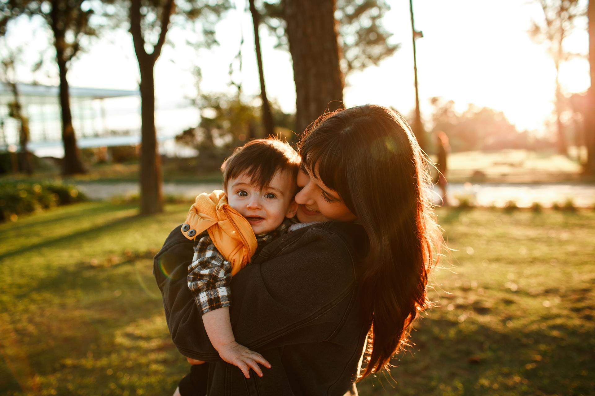 A mother hugging her little son | Source: Pexels