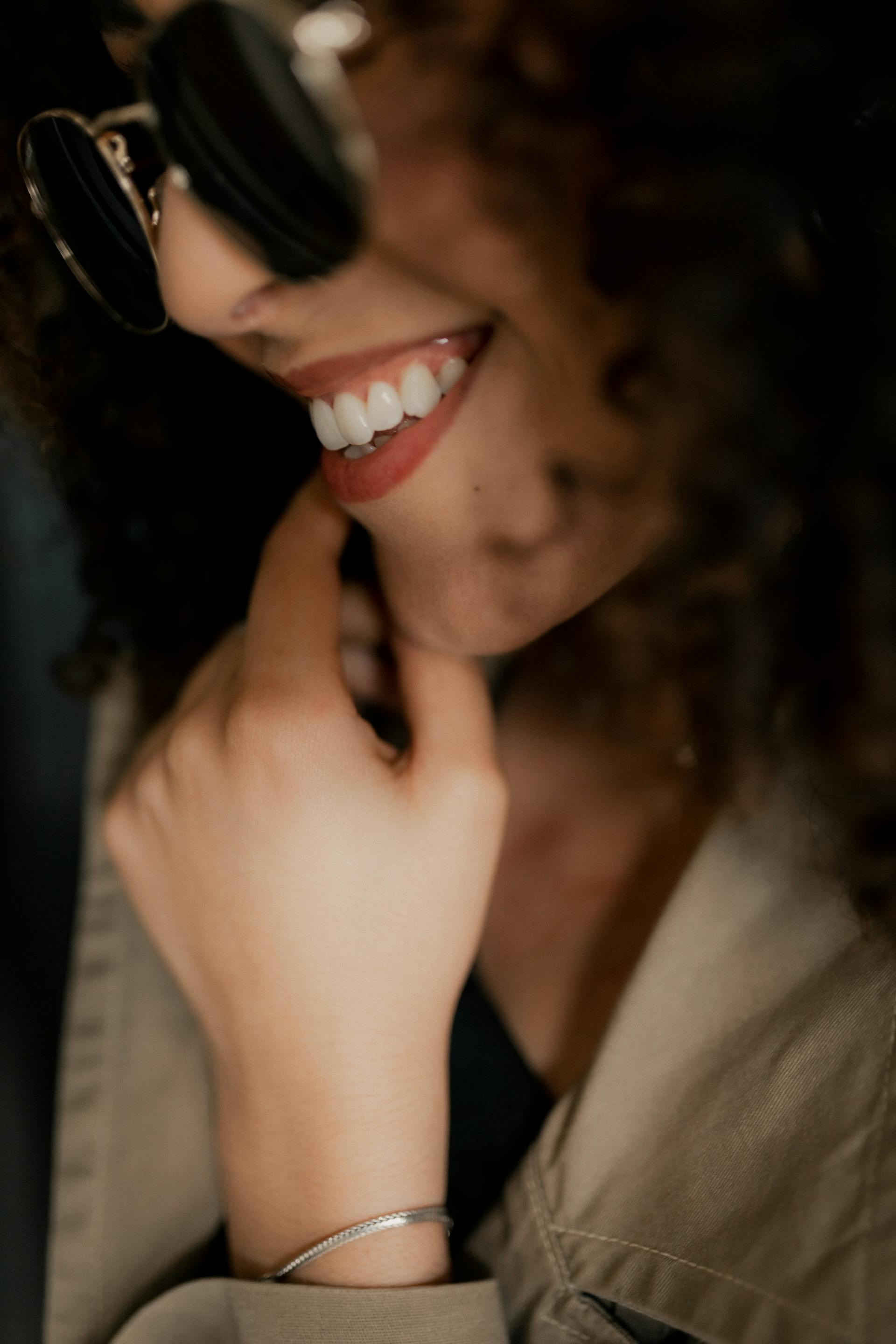 A woman with a satisfied smile | Source: Pexels