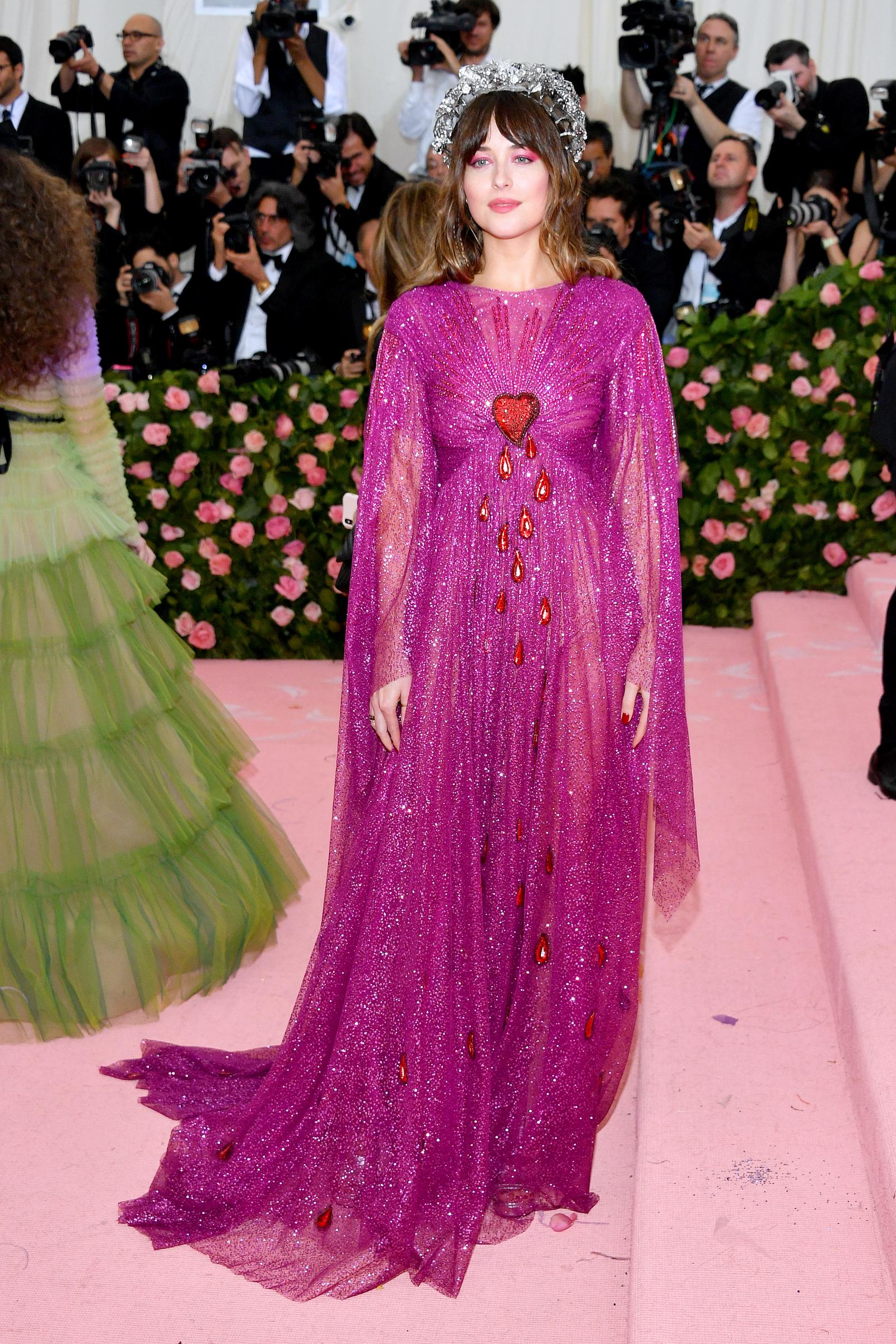 Dakota Johnson attends The 2019 Met Gala Celebrating Camp: Notes on Fashion at Metropolitan Museum of Art on May 06, 2019 in New York City. | Source: Getty Images