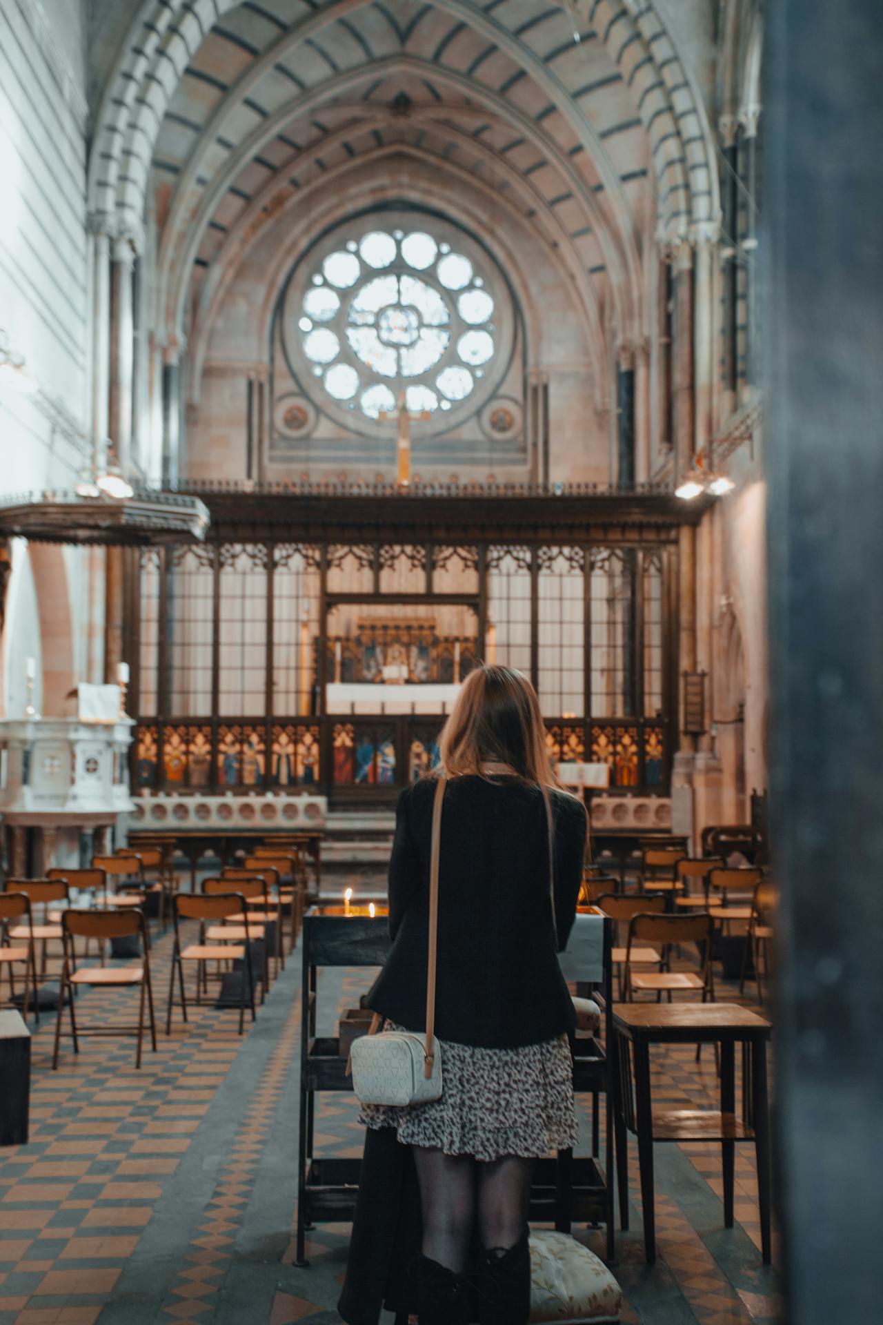 A woman in church | Source: Pexels