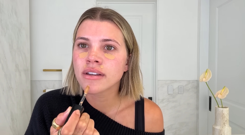 Sofia Richie doing her beauty routine from a video dated July 25, 2025. | Source: YouTube/Vogue