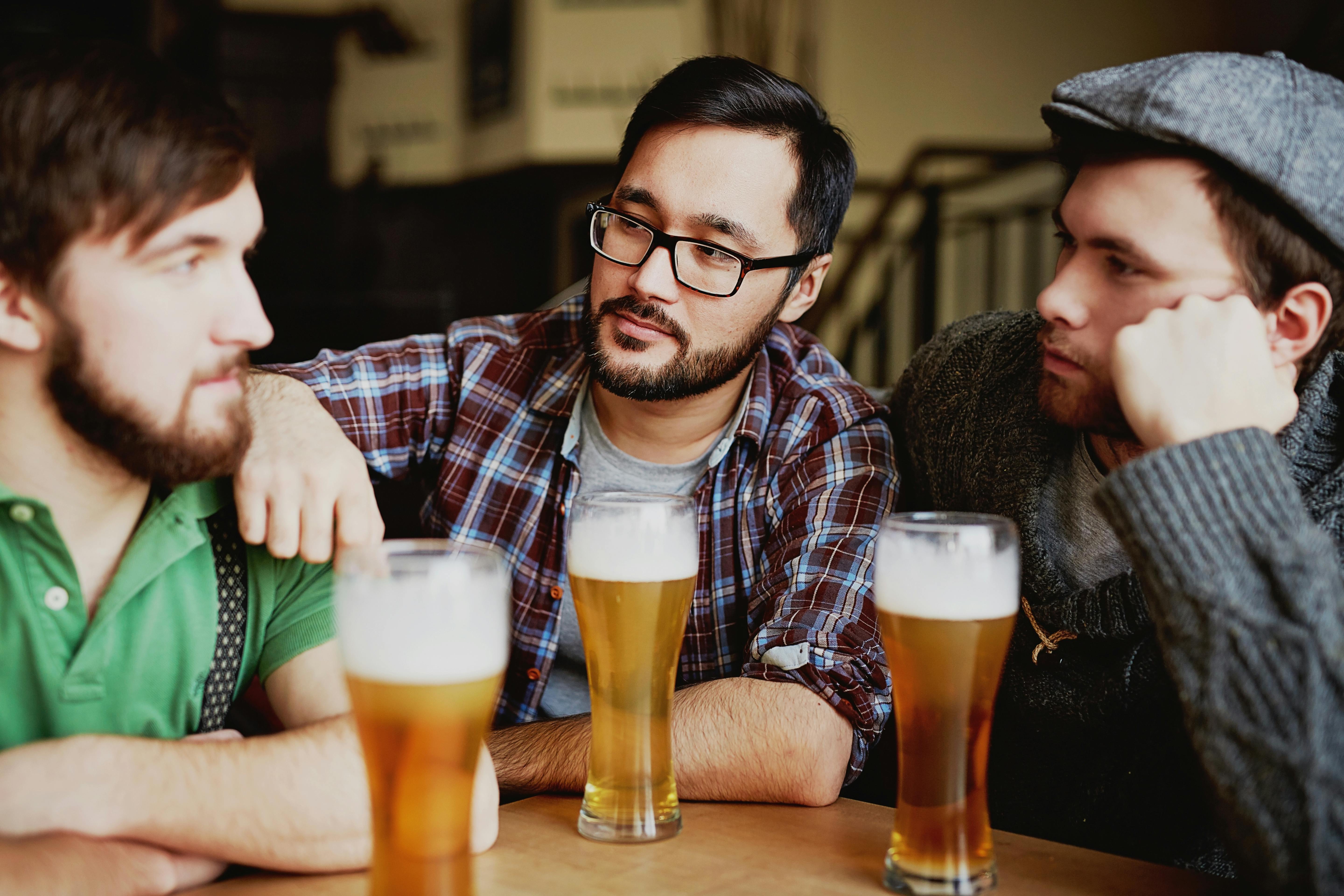 Men talking during a party | Source: Pexels