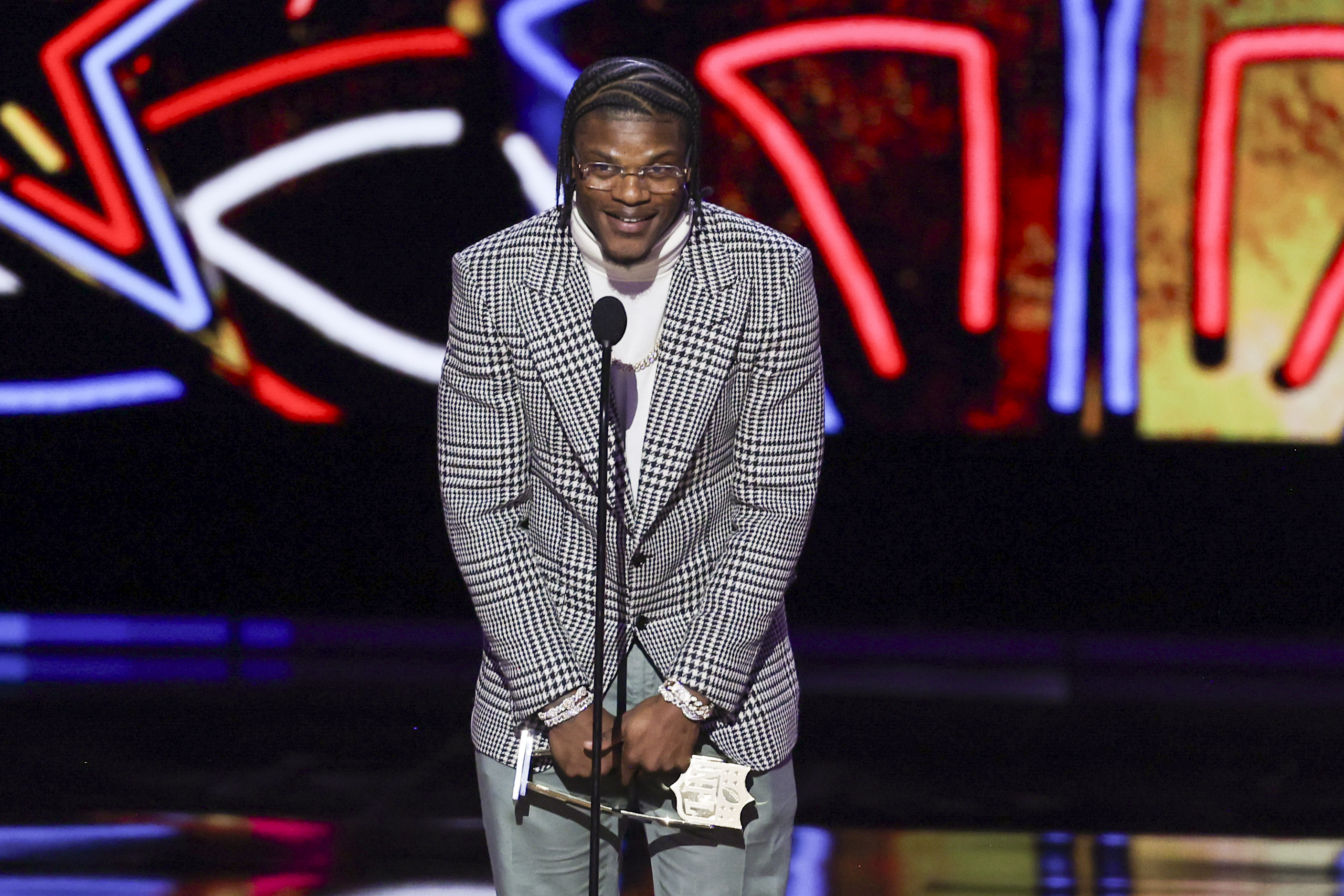 Lamar Jackson accepts the award for Most Valuable Player during the 13th Annual NFL Honors on February 8, 2024, in Las Vegas, Nevada | Source: Getty Images