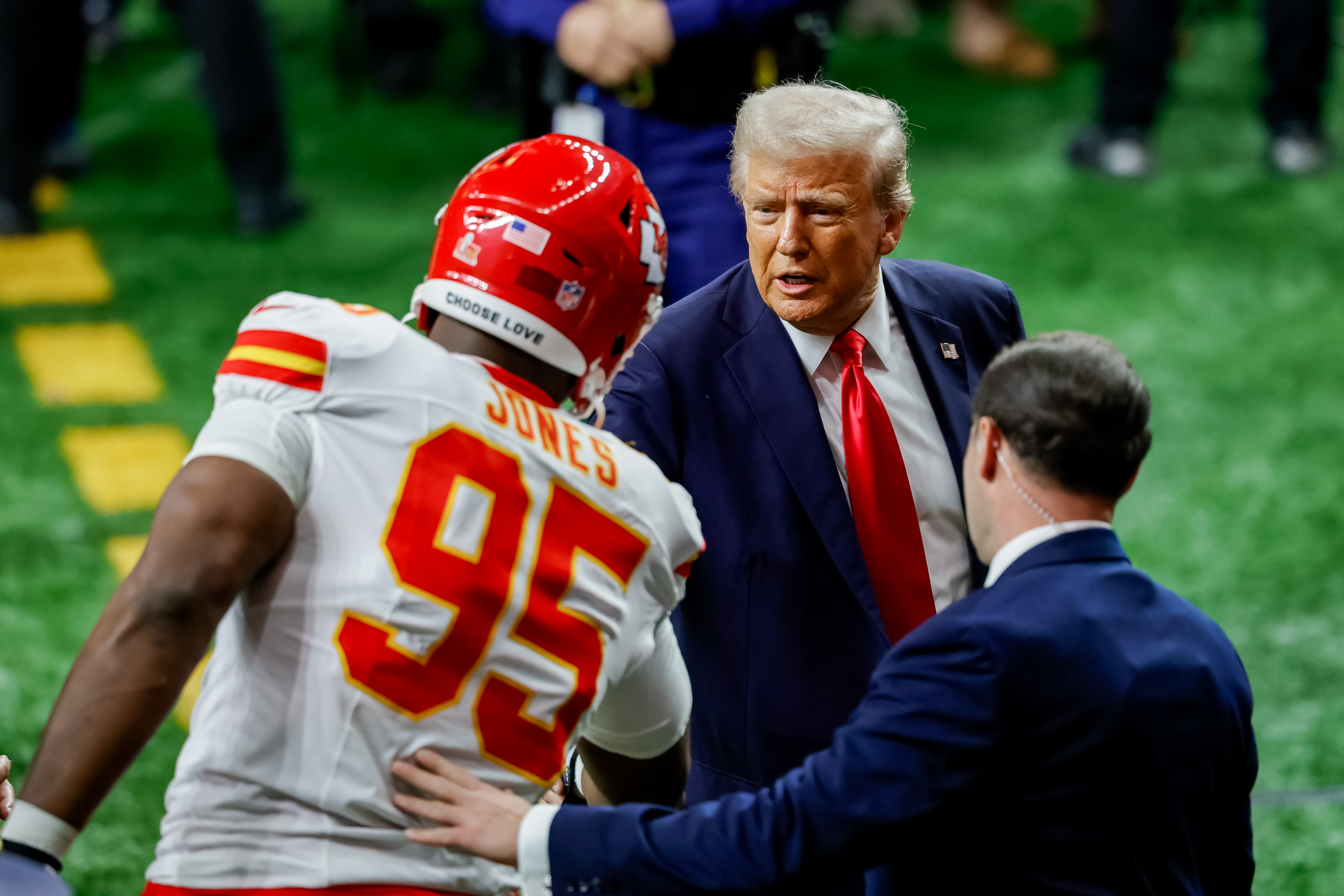 Donald Trump shakes the hand of DT Chris Jones before Super Bowl LIX on February 9, 2025, in New Orleans, Louisiana. | Source: Getty Images