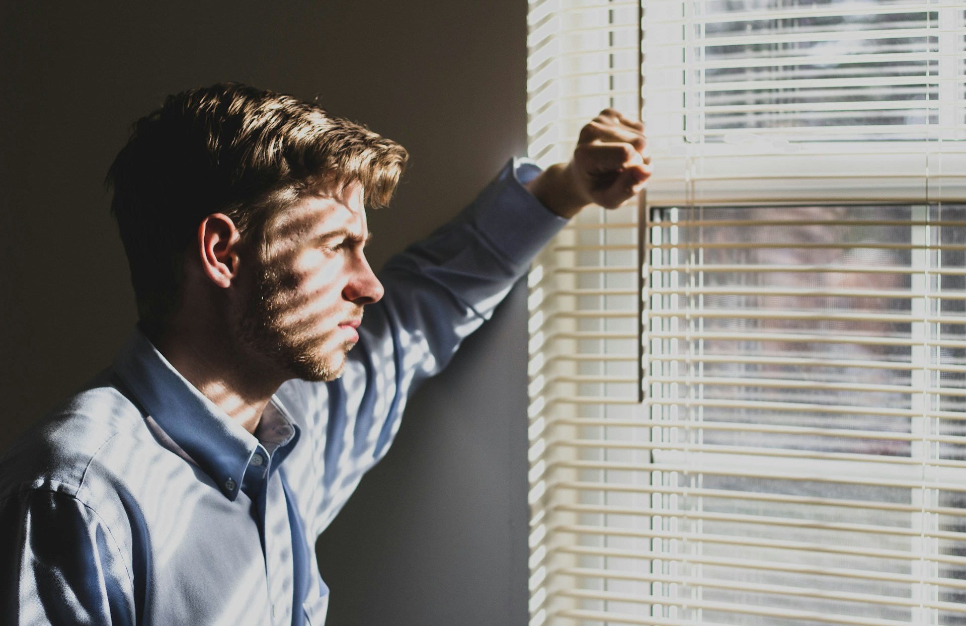 A man with a grim expression | Source: Unsplash
