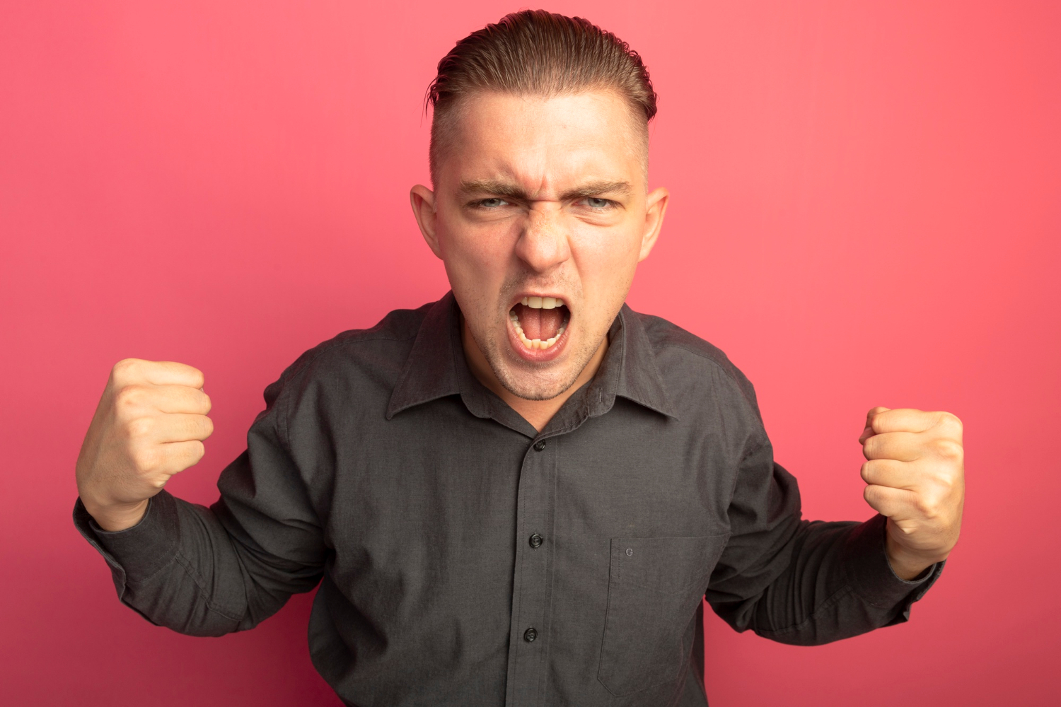A frustrated man yelling at someone | Source: Freepik